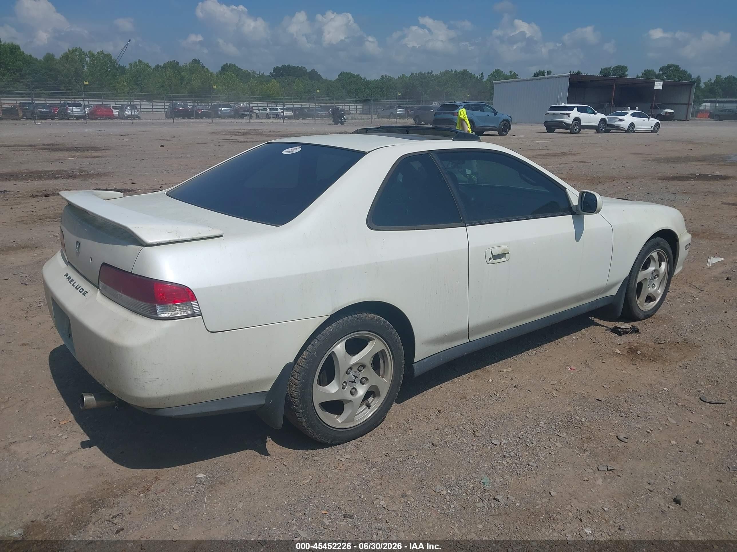 1998 Honda Prelude   White vin: JHMBB6145WC014523