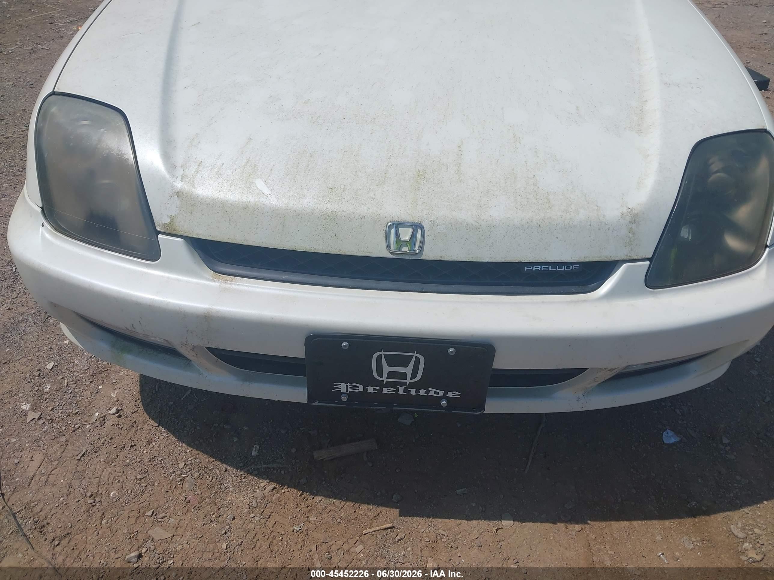 1998 Honda Prelude   White vin: JHMBB6145WC014523