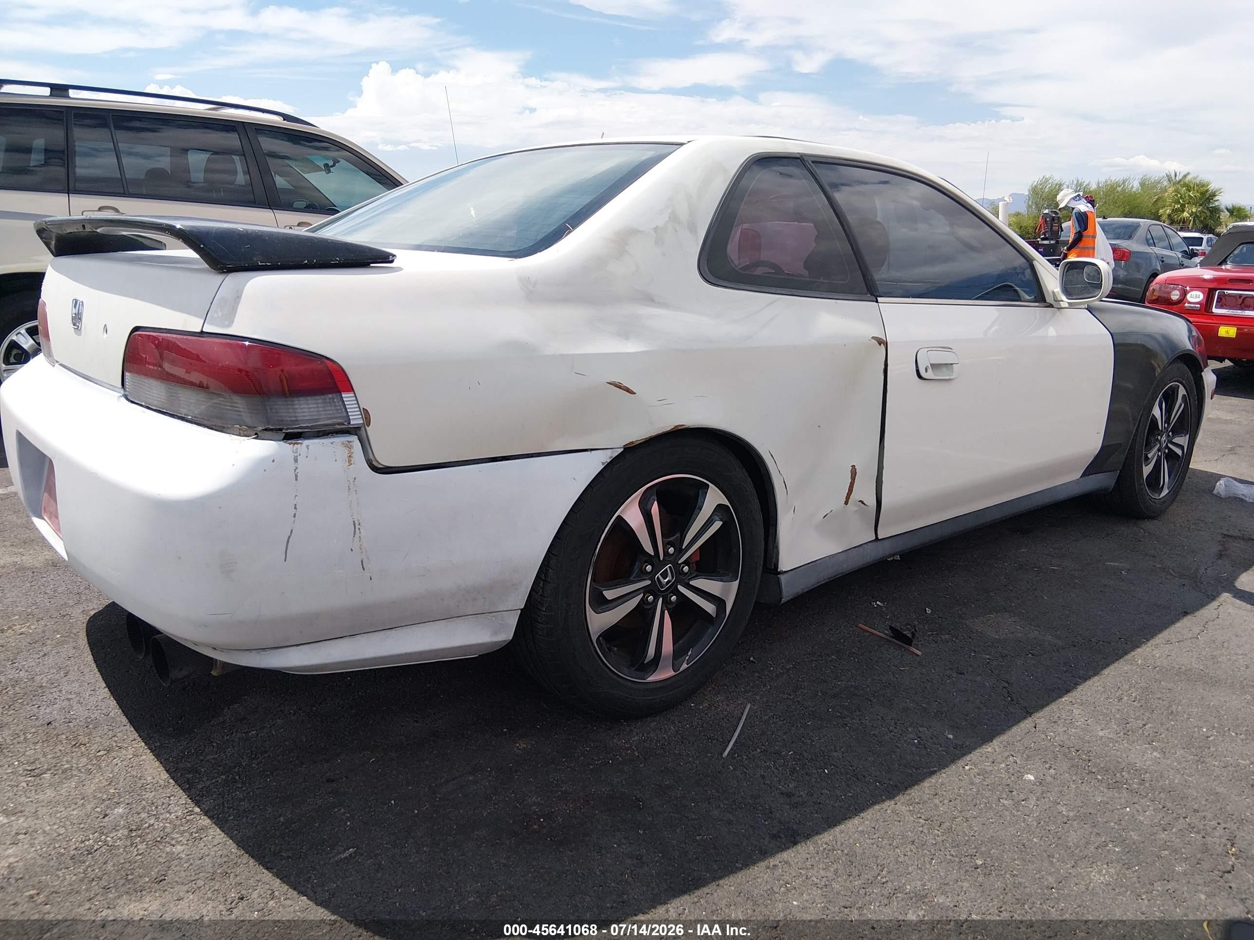 1999 Honda Prelude   White vin: JHMBB6245XC010357
