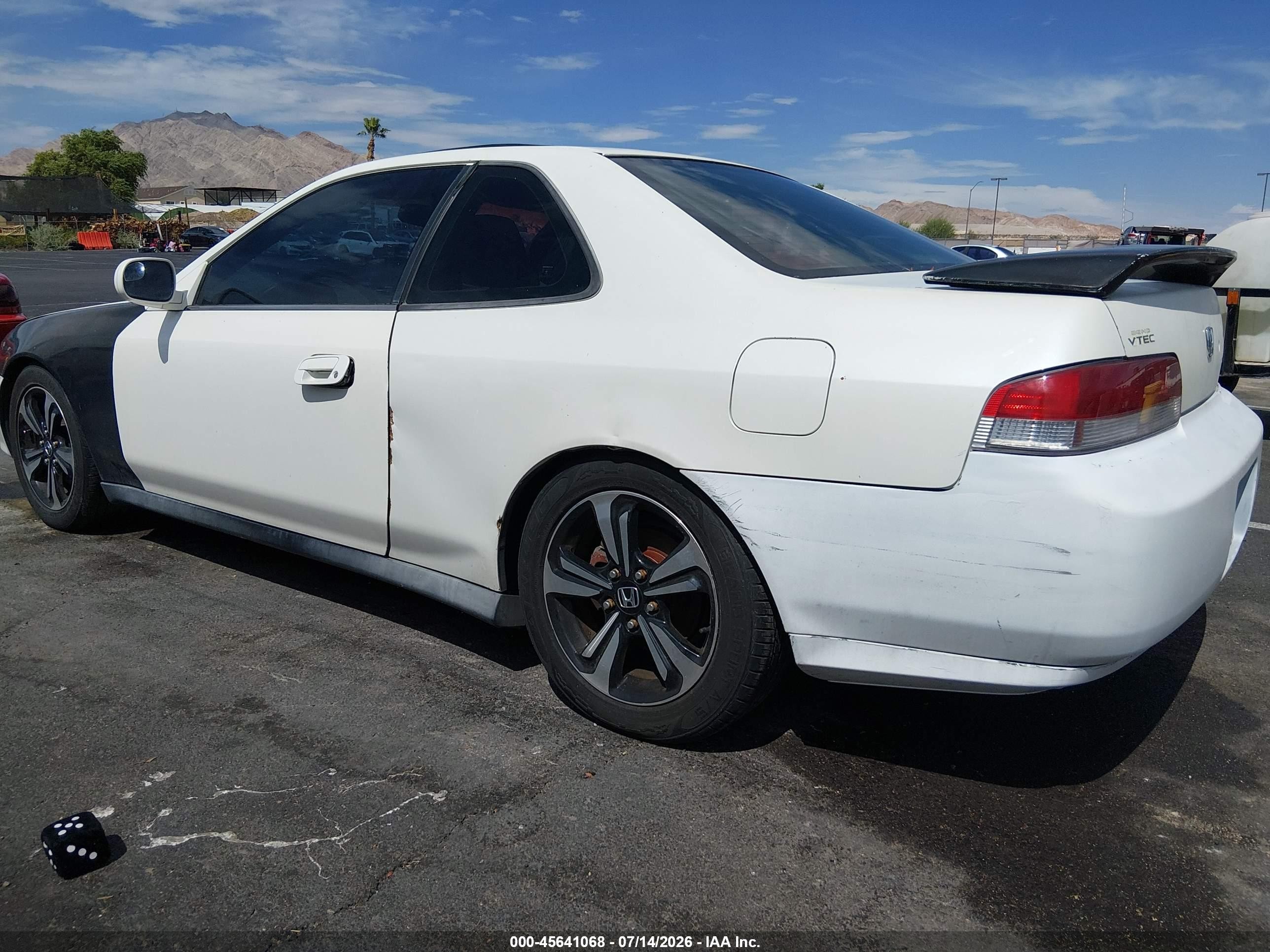 1999 Honda Prelude   White vin: JHMBB6245XC010357