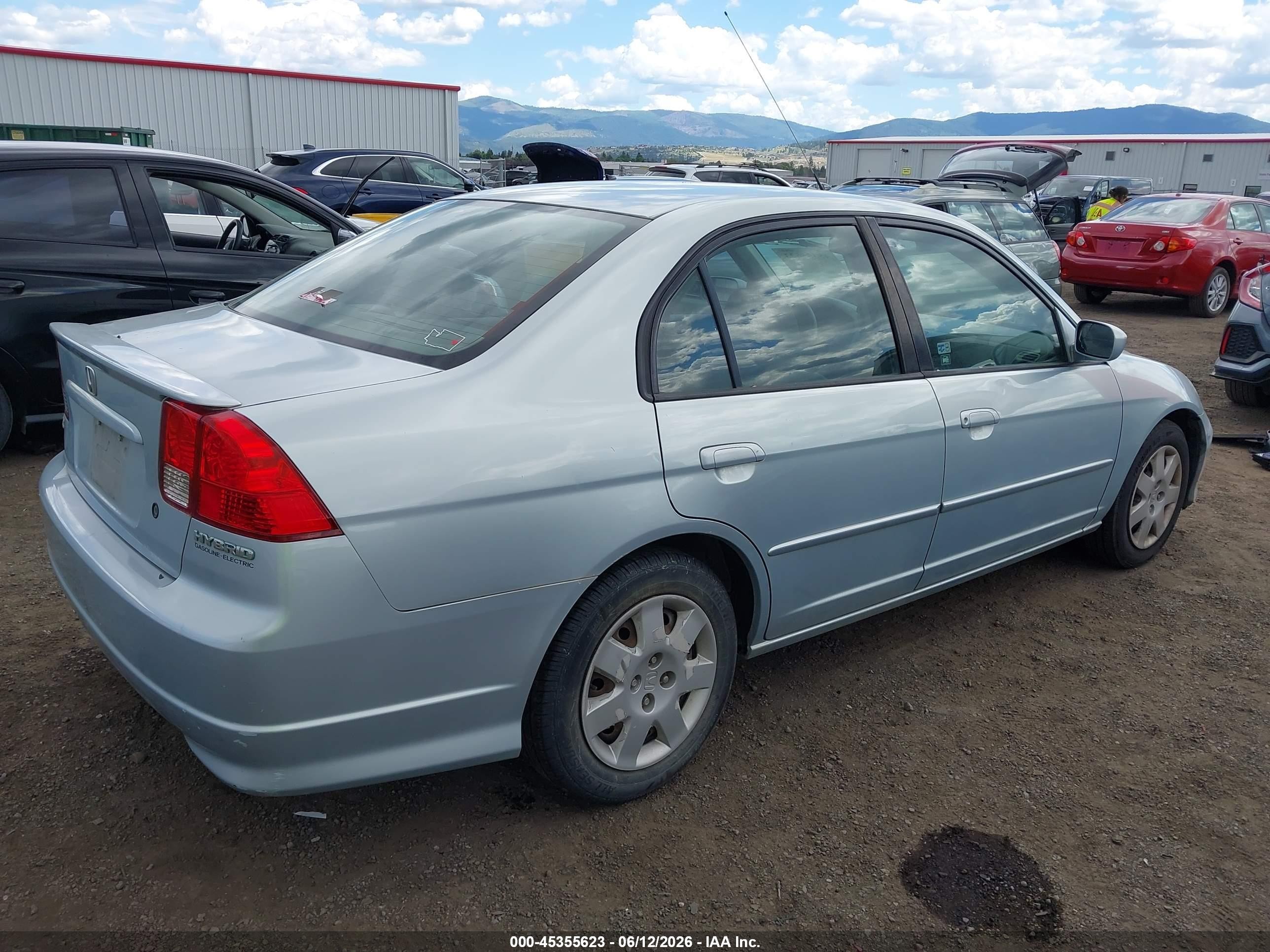 2004 Honda Civic Hybrid Blue vin: JHMES95634S014873