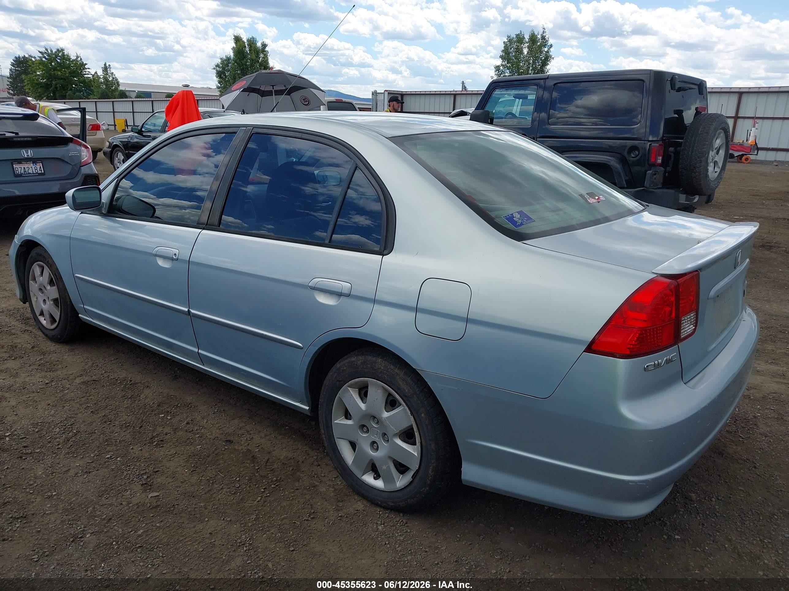 2004 Honda Civic Hybrid Blue vin: JHMES95634S014873