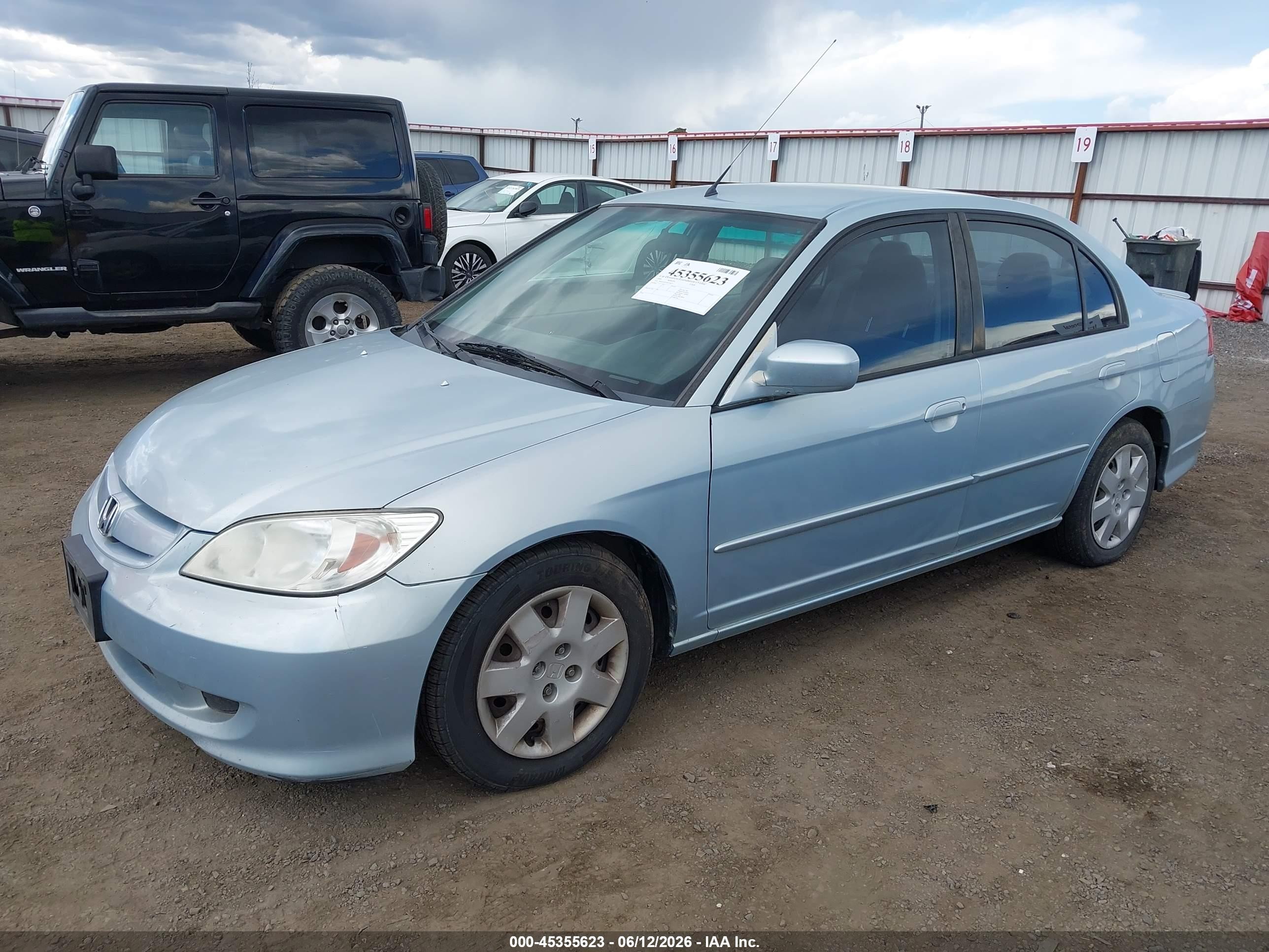 2004 Honda Civic Hybrid Blue vin: JHMES95634S014873