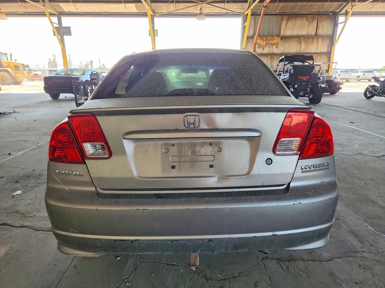 2005 Honda Civic Hybrid Желто-коричневый vin: JHMES95685S021738