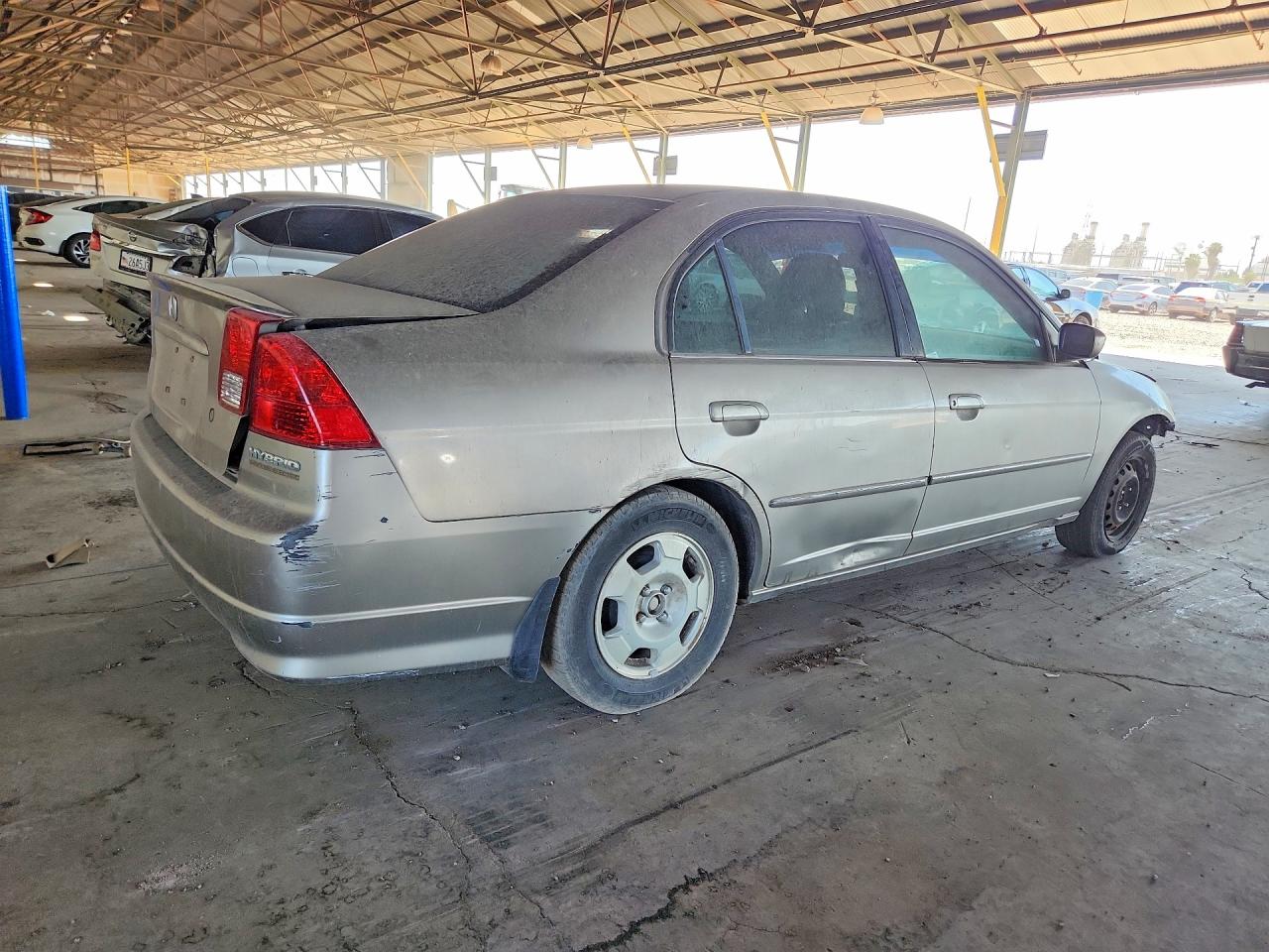 2005 Honda Civic Hybrid Желто-коричневый vin: JHMES95685S021738