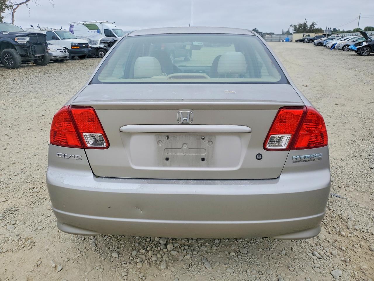 2004 Honda Civic Hybrid Cream vin: JHMES956X4S016569