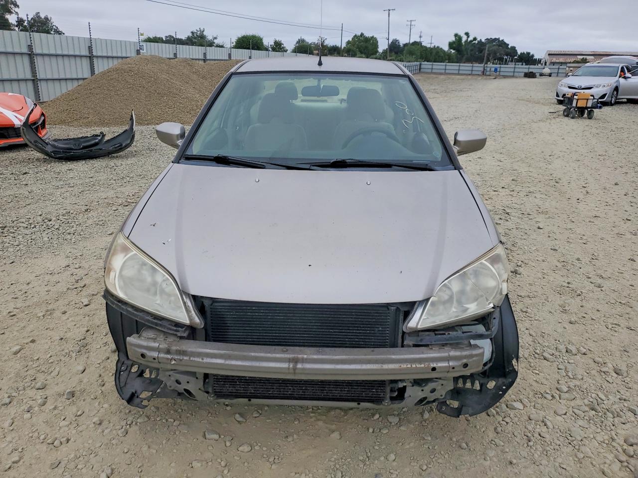 2004 Honda Civic Hybrid Cream vin: JHMES956X4S016569