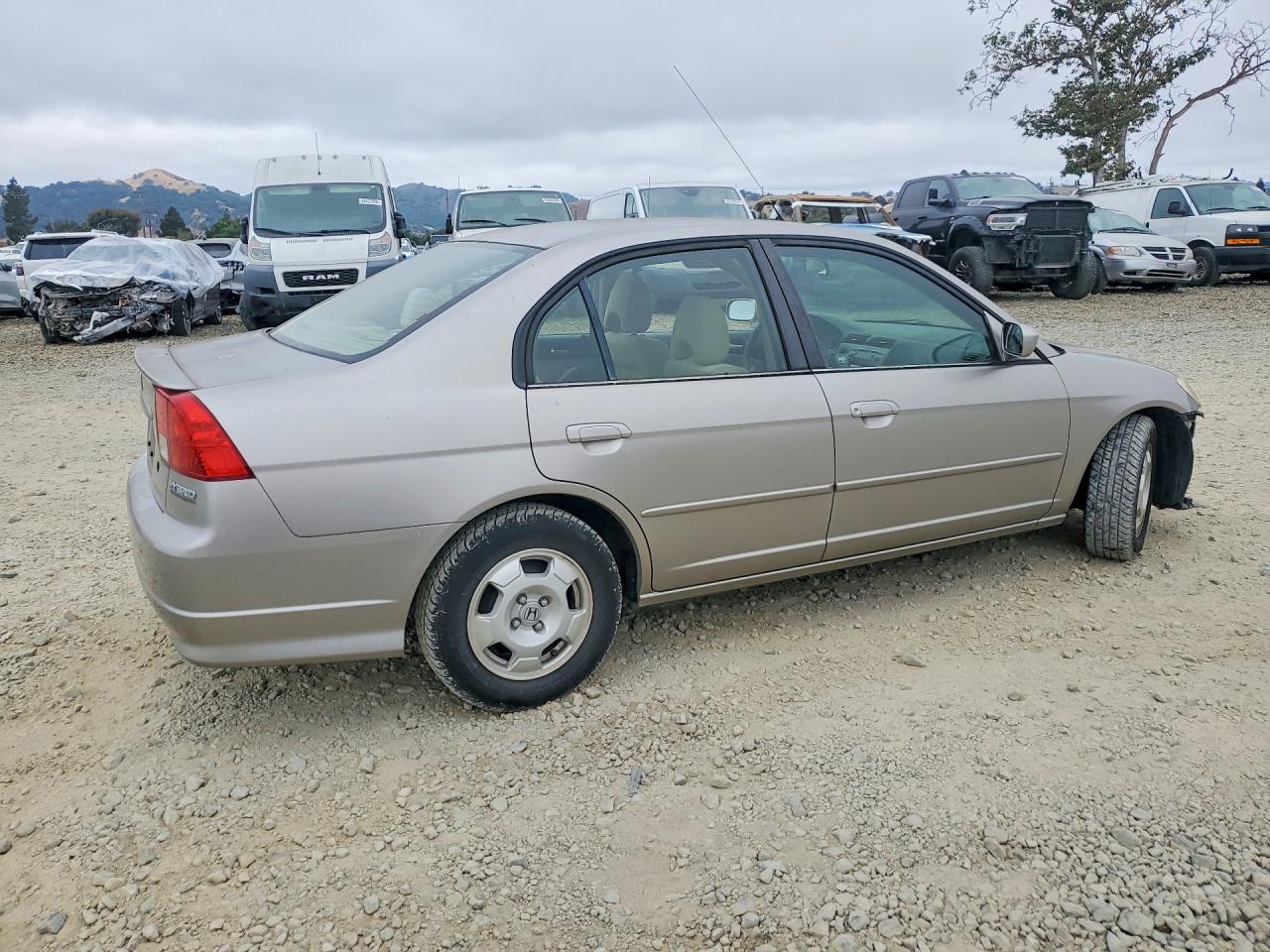 2004 Honda Civic Hybrid Cream vin: JHMES956X4S016569