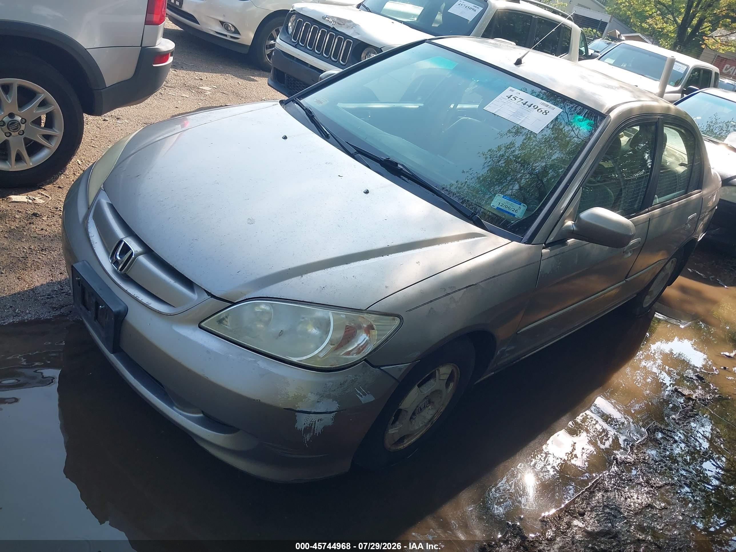 2005 Honda Civic Hybrid   Silver vin: JHMES96615S012409