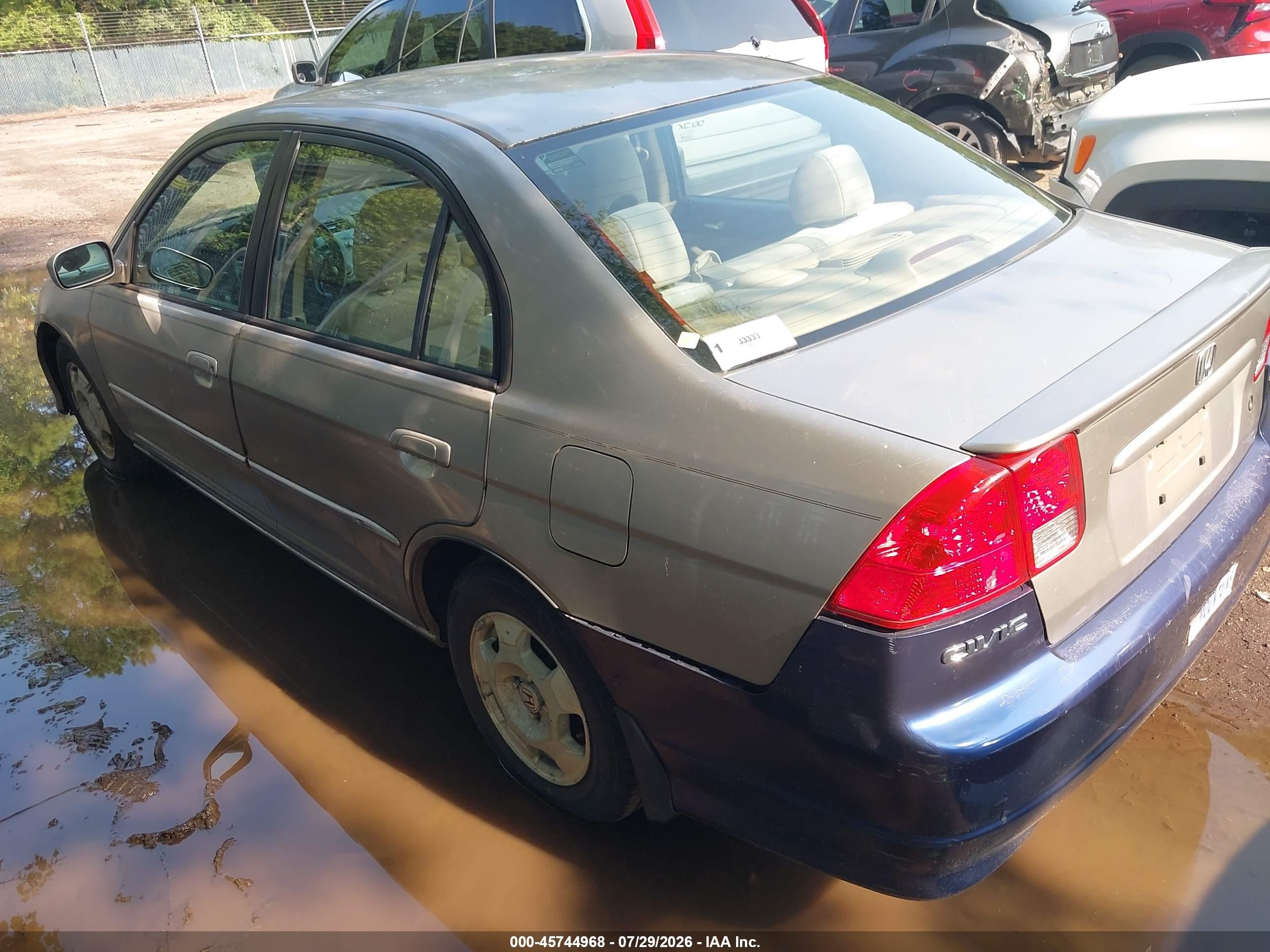 2005 Honda Civic Hybrid   Silver vin: JHMES96615S012409