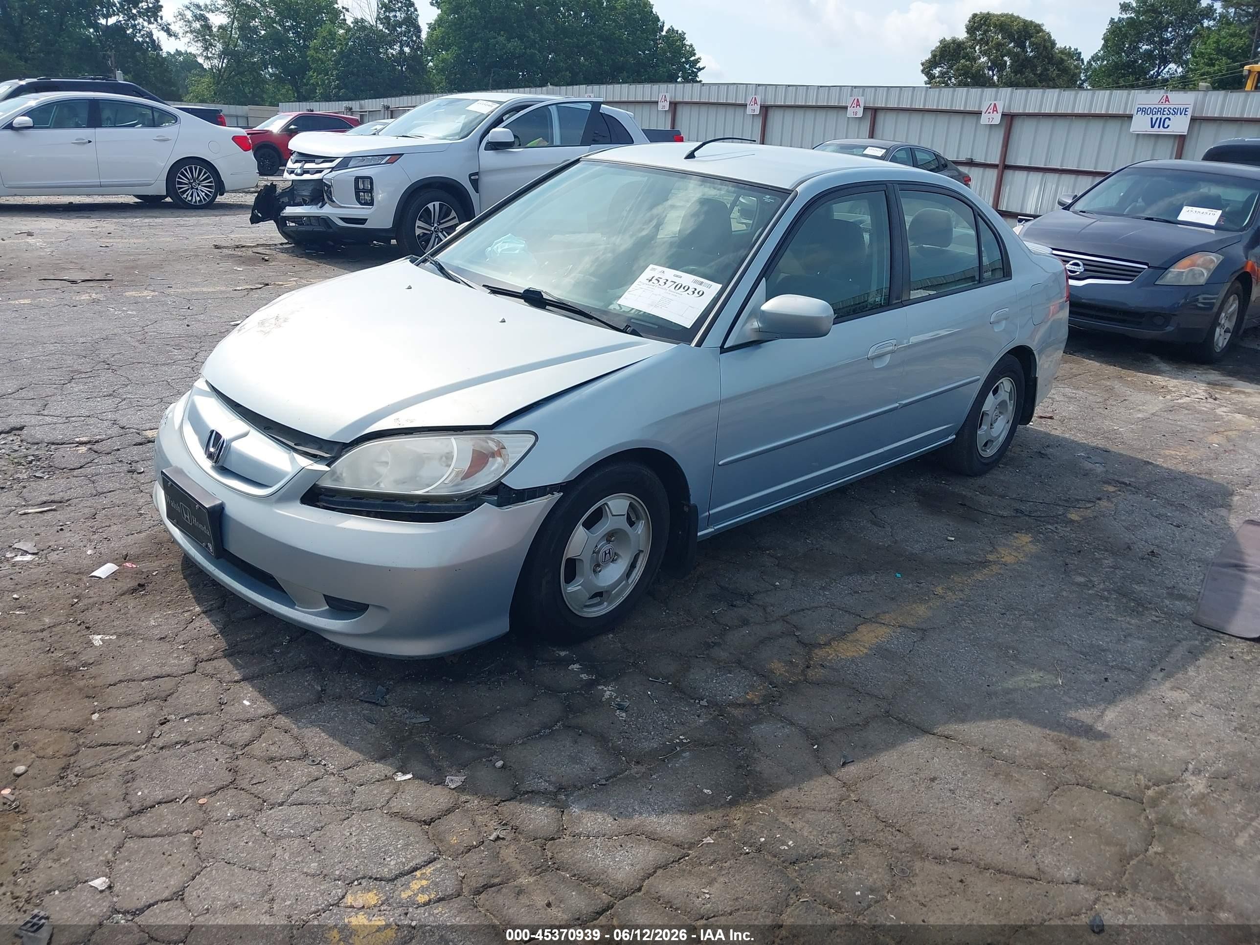 2005 Honda Civic Hybrid   Light Blue vin: JHMES96645S017264