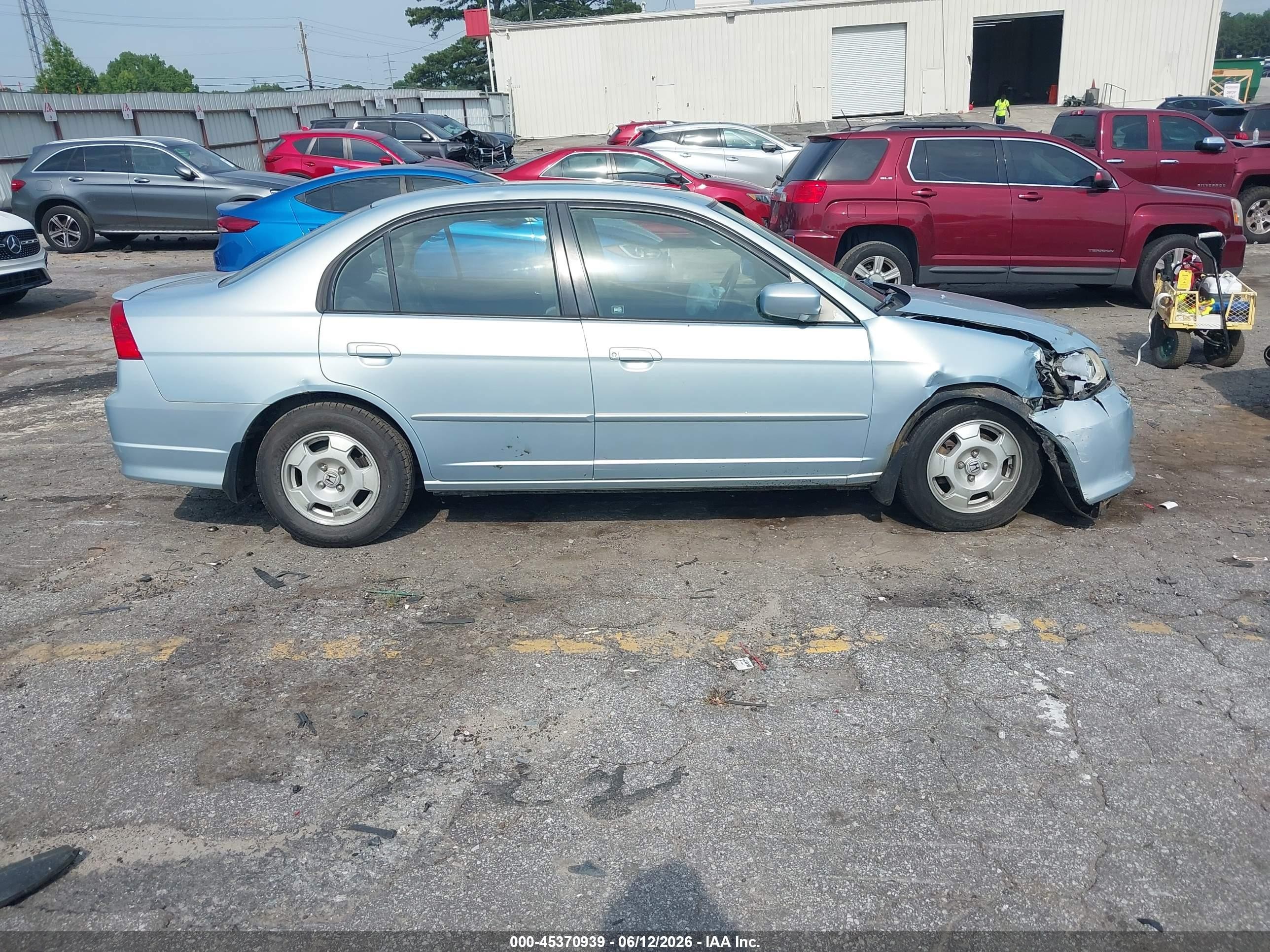 2005 Honda Civic Hybrid   Light Blue vin: JHMES96645S017264