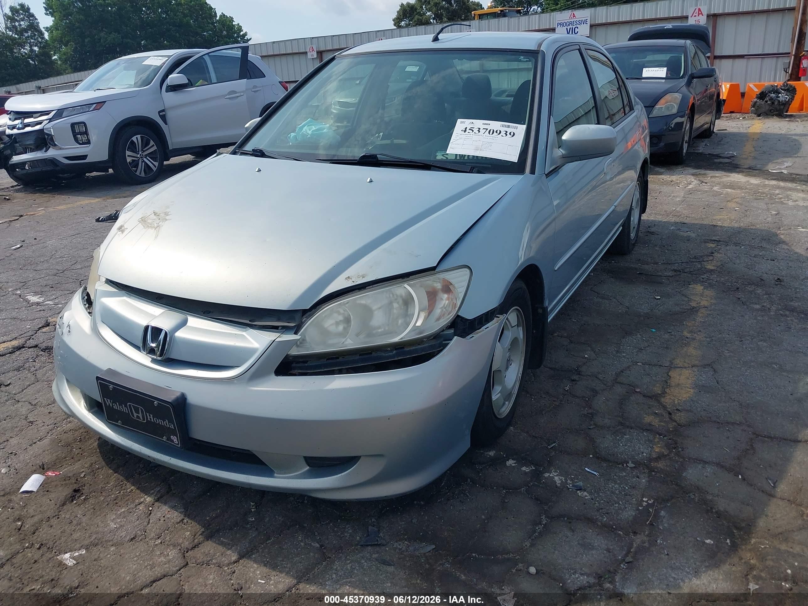 2005 Honda Civic Hybrid   Light Blue vin: JHMES96645S017264