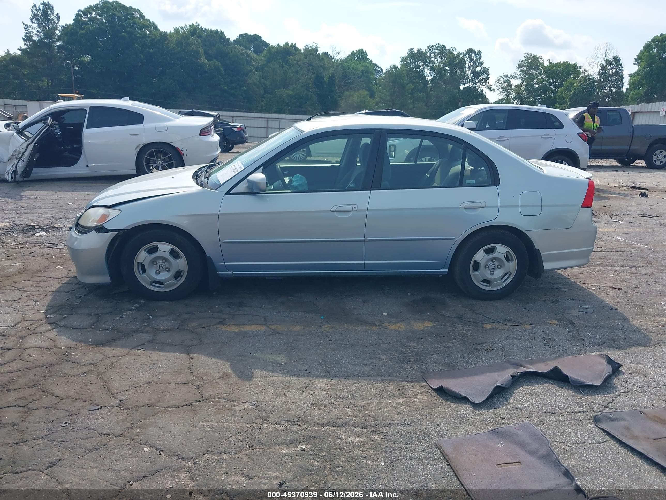 2005 Honda Civic Hybrid   Light Blue vin: JHMES96645S017264