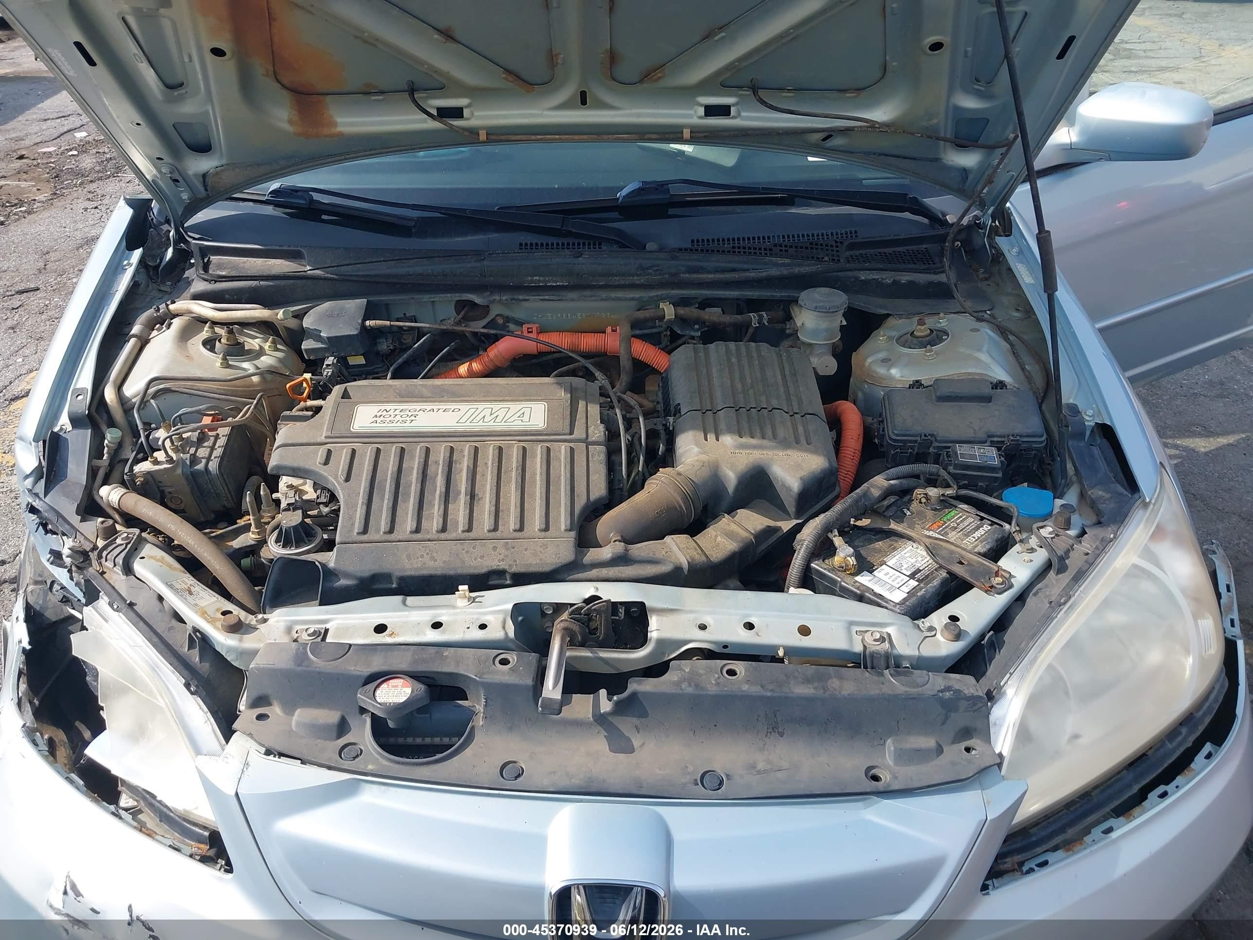 2005 Honda Civic Hybrid   Light Blue vin: JHMES96645S017264