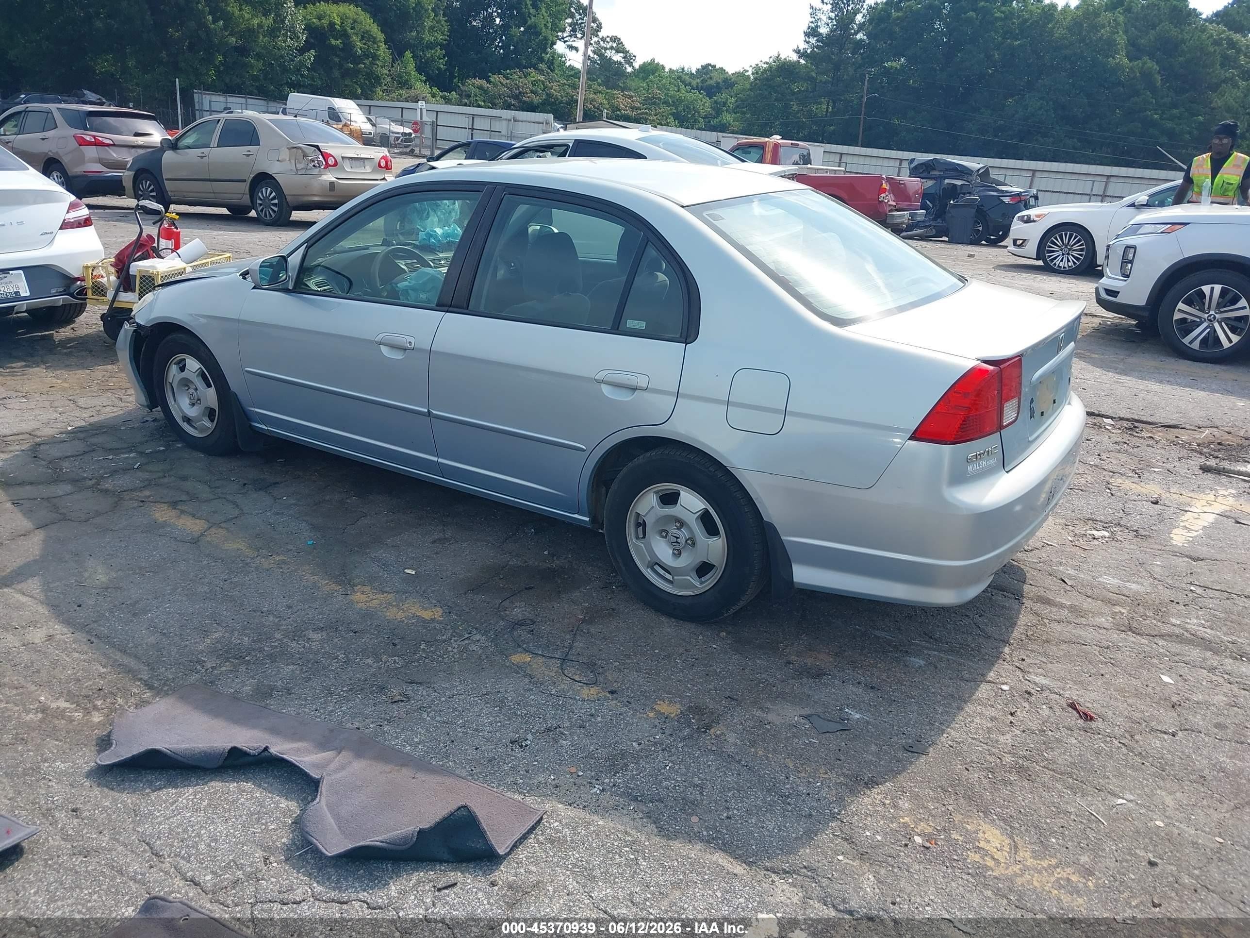 2005 Honda Civic Hybrid   Light Blue vin: JHMES96645S017264