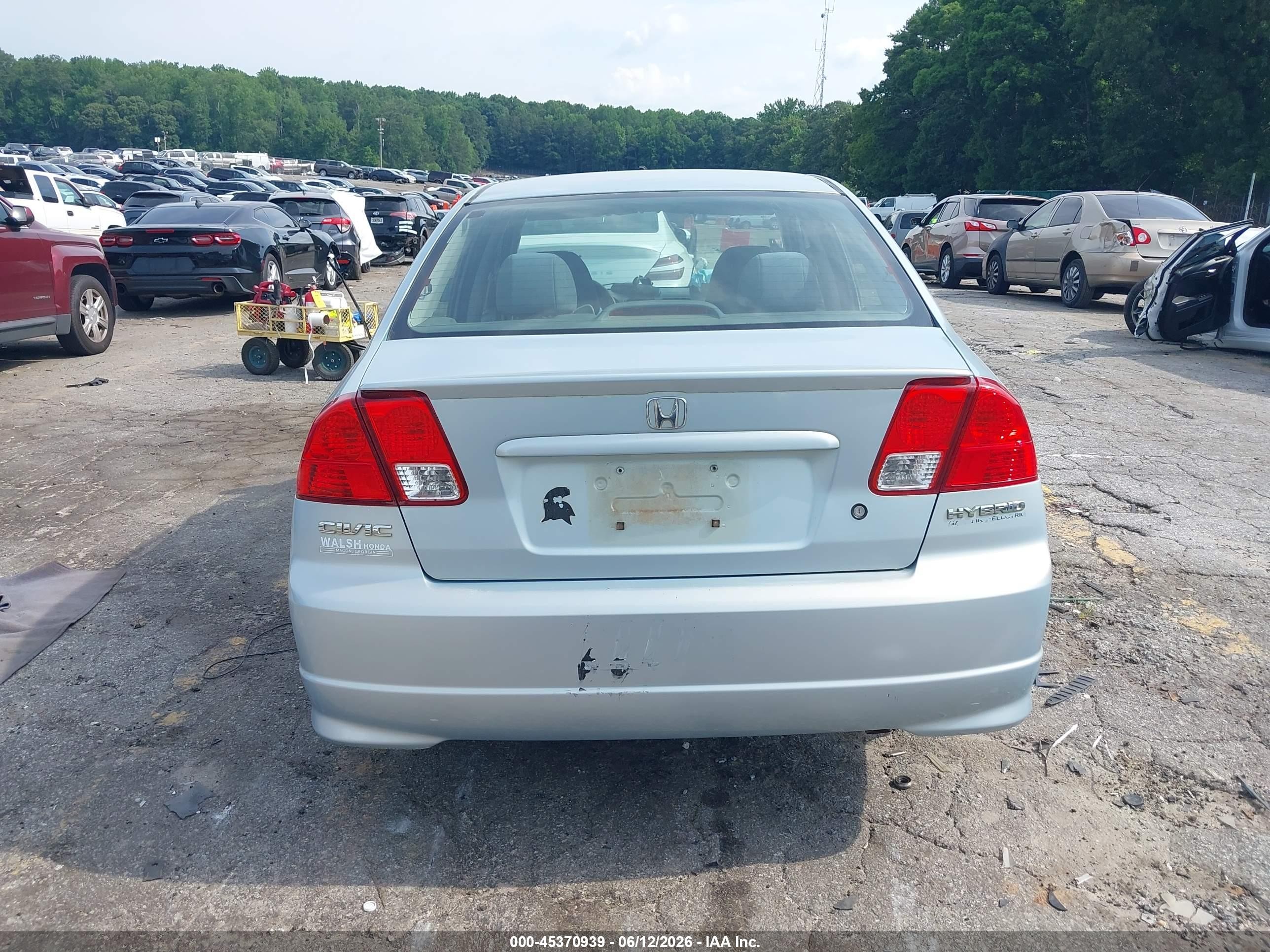 2005 Honda Civic Hybrid   Light Blue vin: JHMES96645S017264