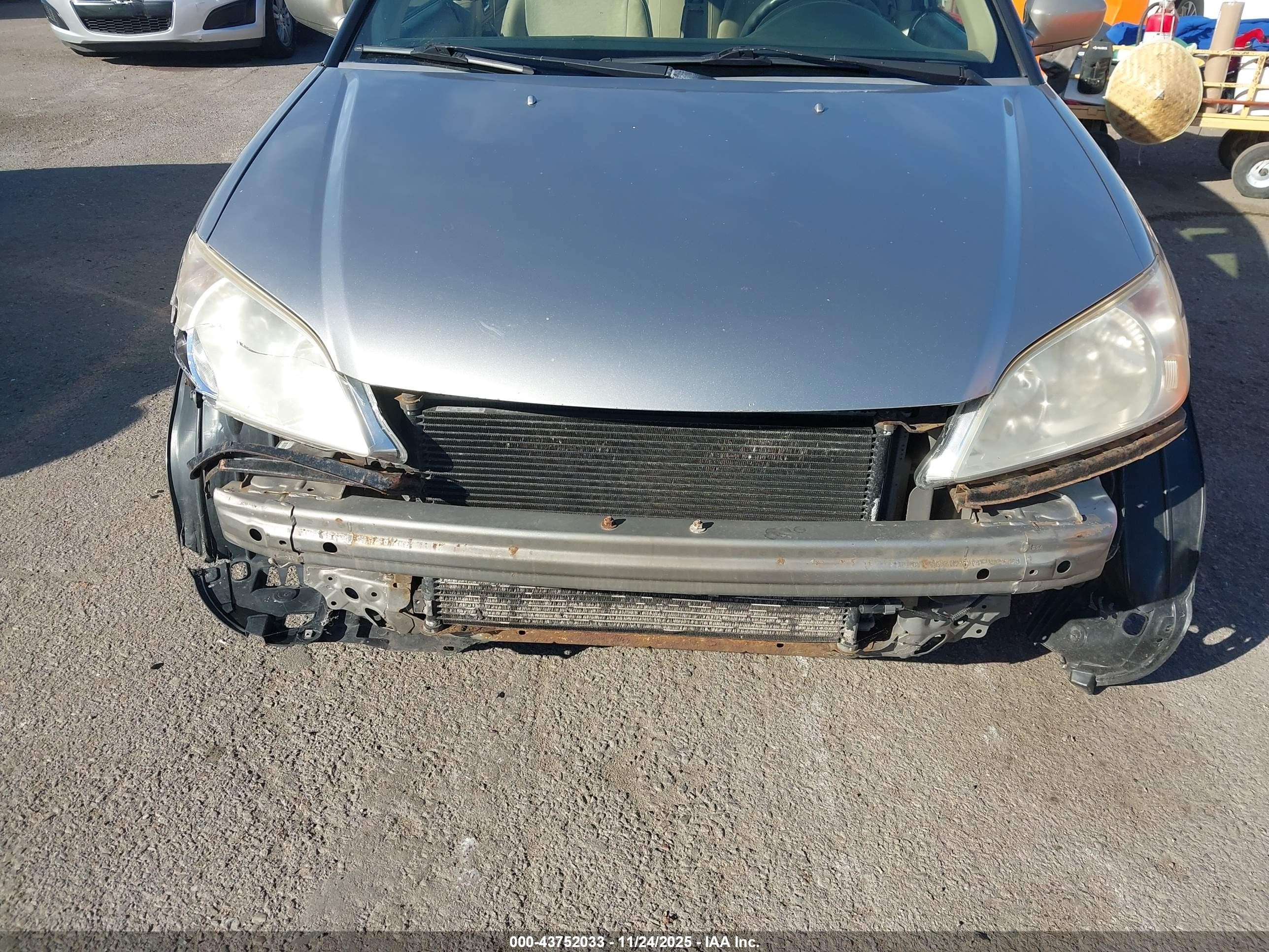 2005 Honda Civic Hybrid   Silver vin: JHMES96685S023973