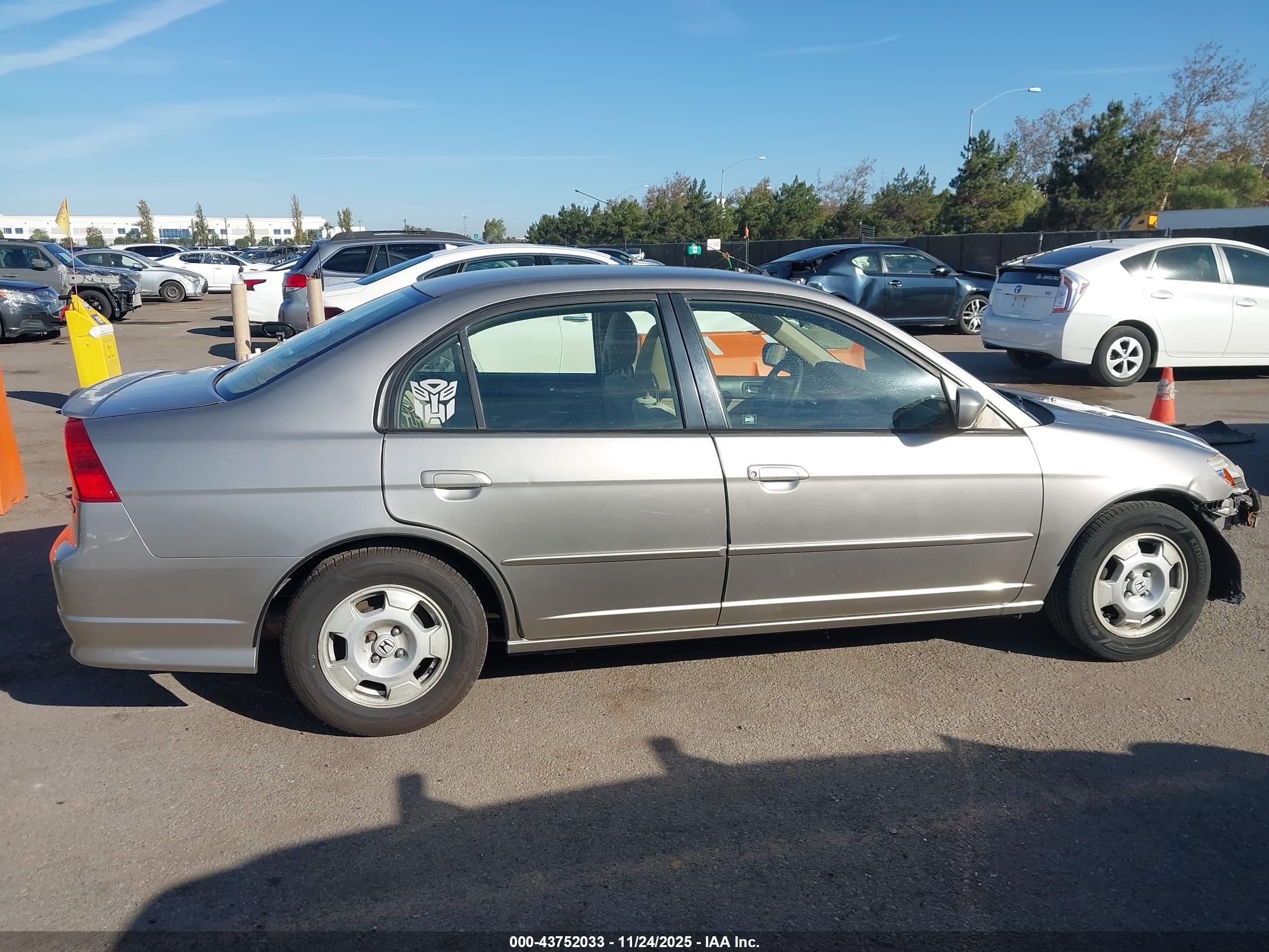 2005 Honda Civic Hybrid   Silver vin: JHMES96685S023973