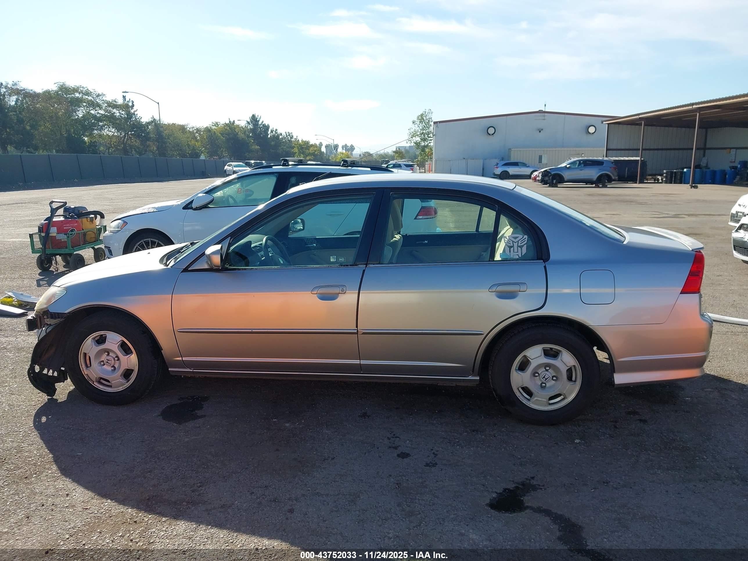 2005 Honda Civic Hybrid   Silver vin: JHMES96685S023973