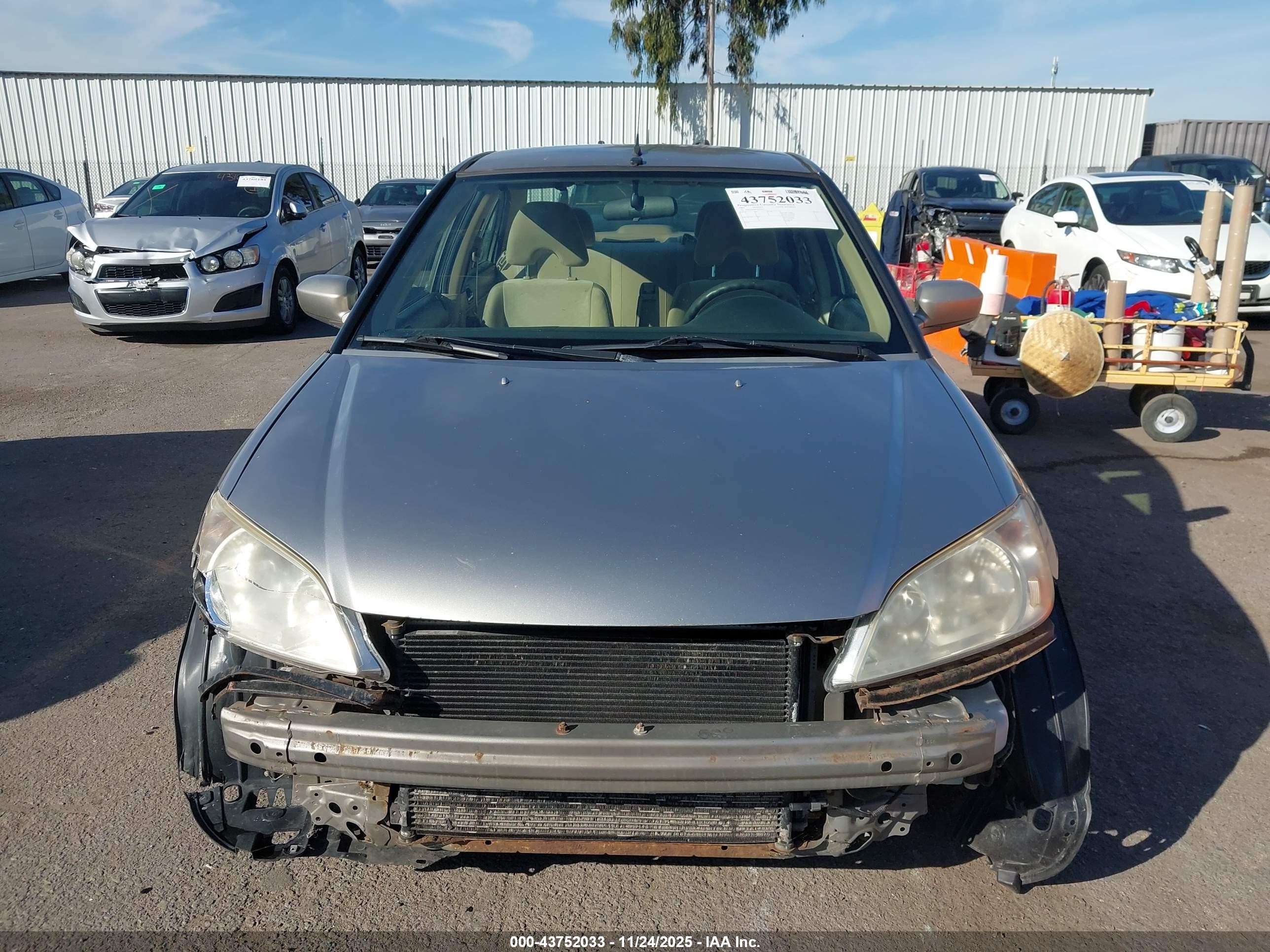 2005 Honda Civic Hybrid   Silver vin: JHMES96685S023973