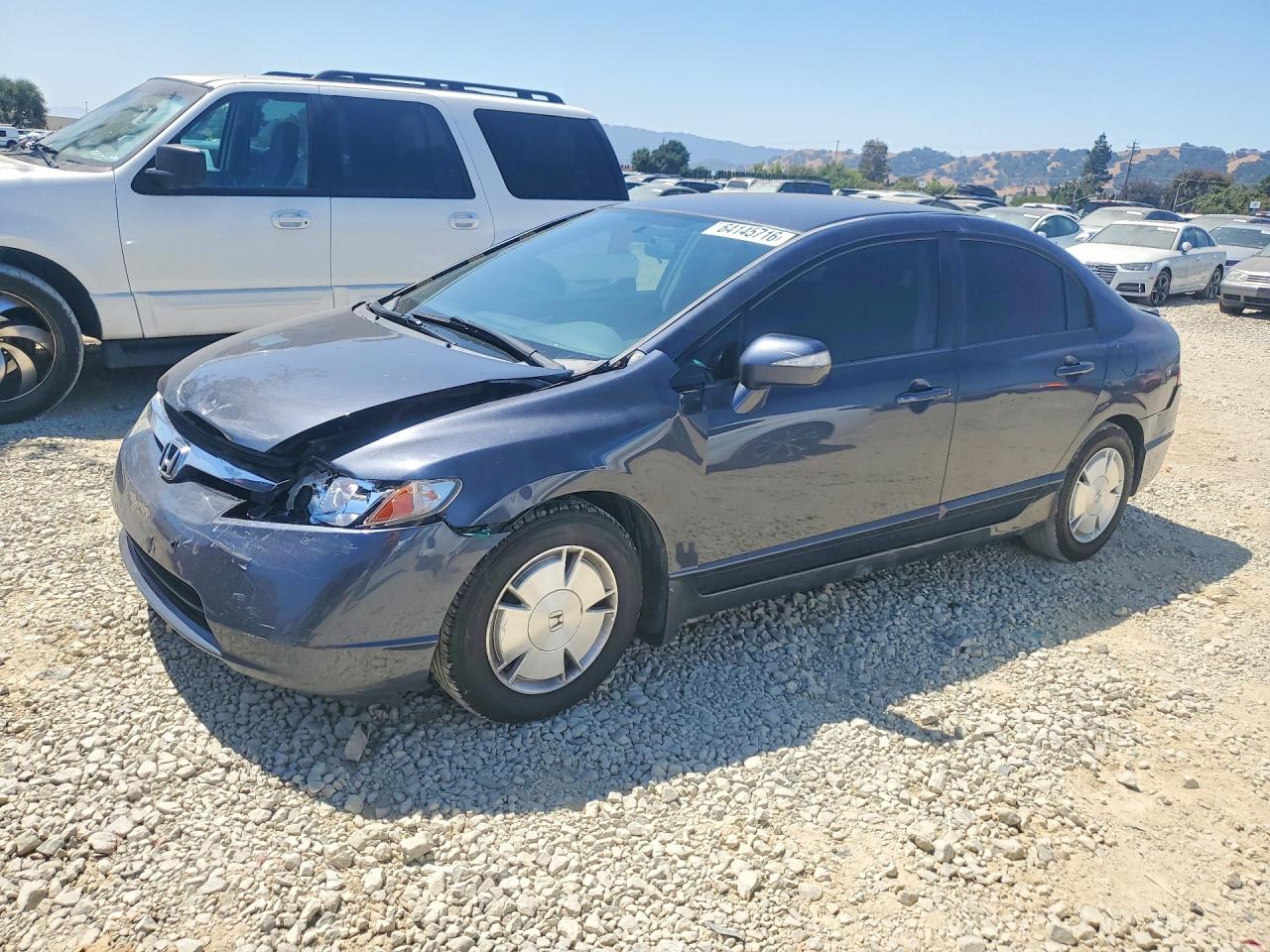 2006 Honda Civic Hybrid Blue vin: JHMFA36206S012338