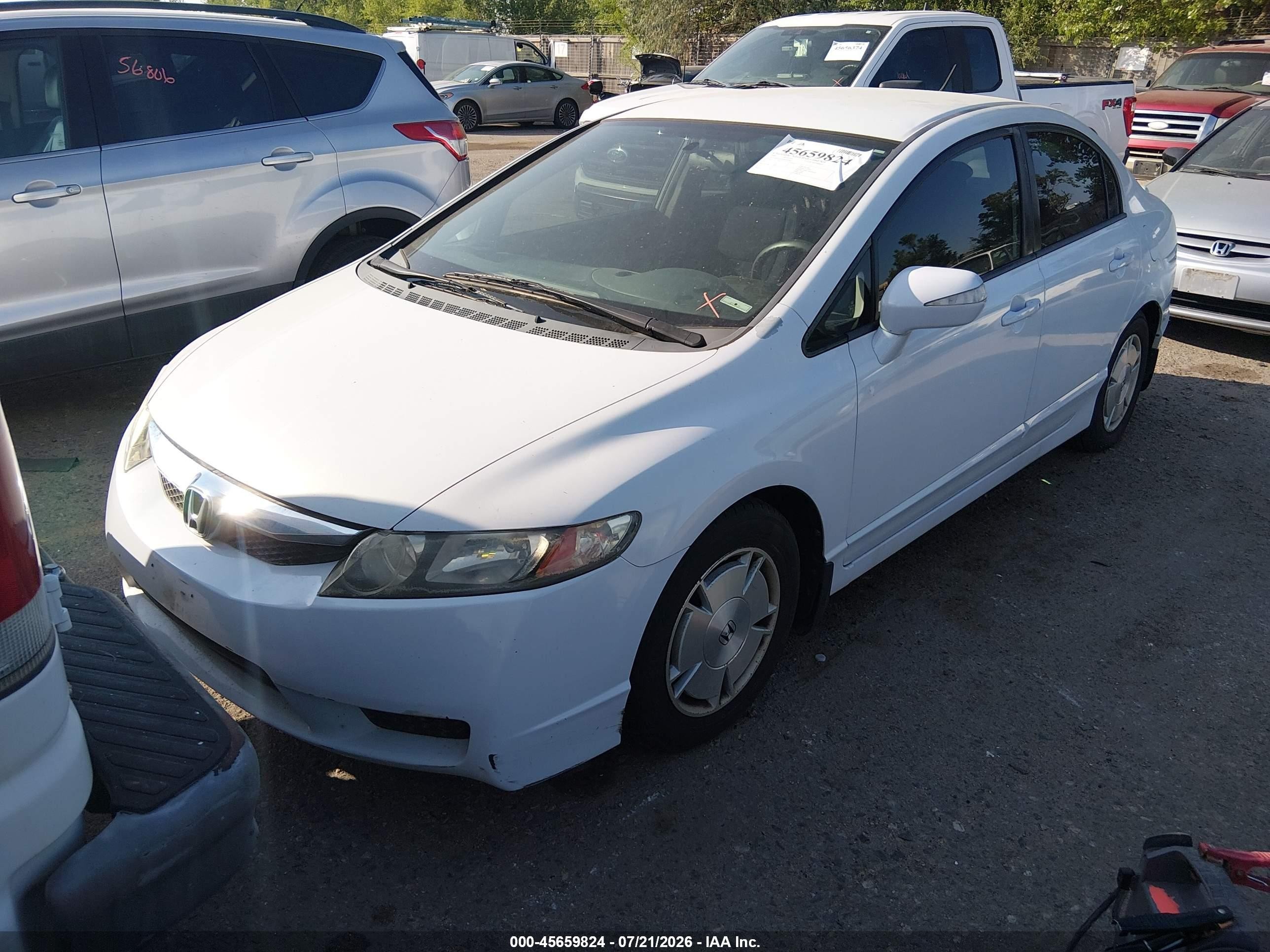 2009 Honda Civic Hybrid   White vin: JHMFA36209S004499