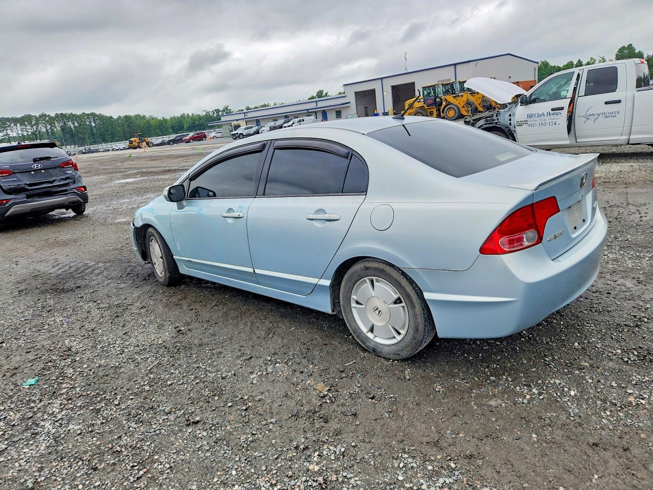2006 Honda Civic Hybrid Blue vin: JHMFA36216S029374