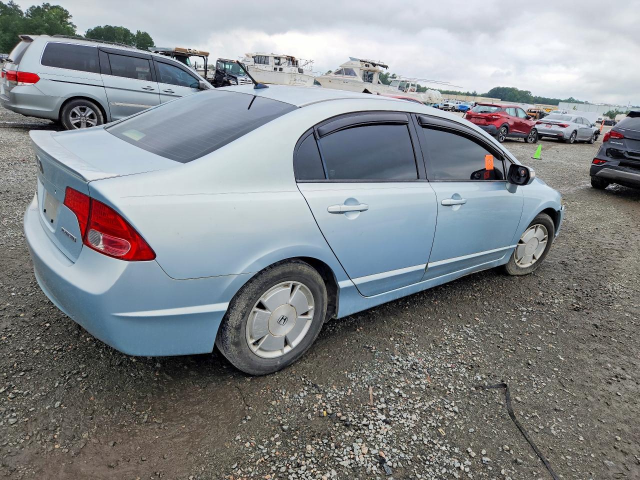 2006 Honda Civic Hybrid Blue vin: JHMFA36216S029374