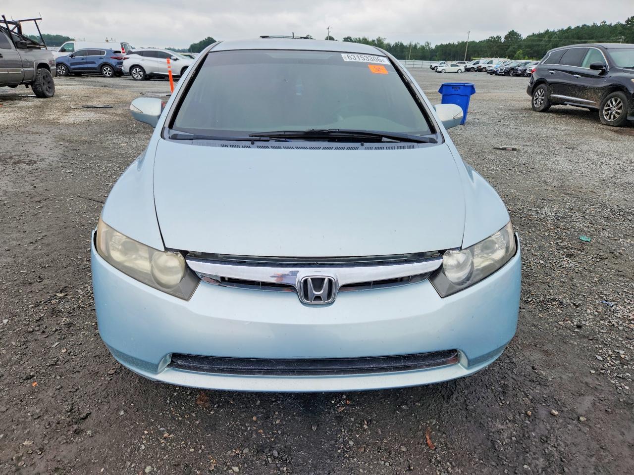 2006 Honda Civic Hybrid Blue vin: JHMFA36216S029374