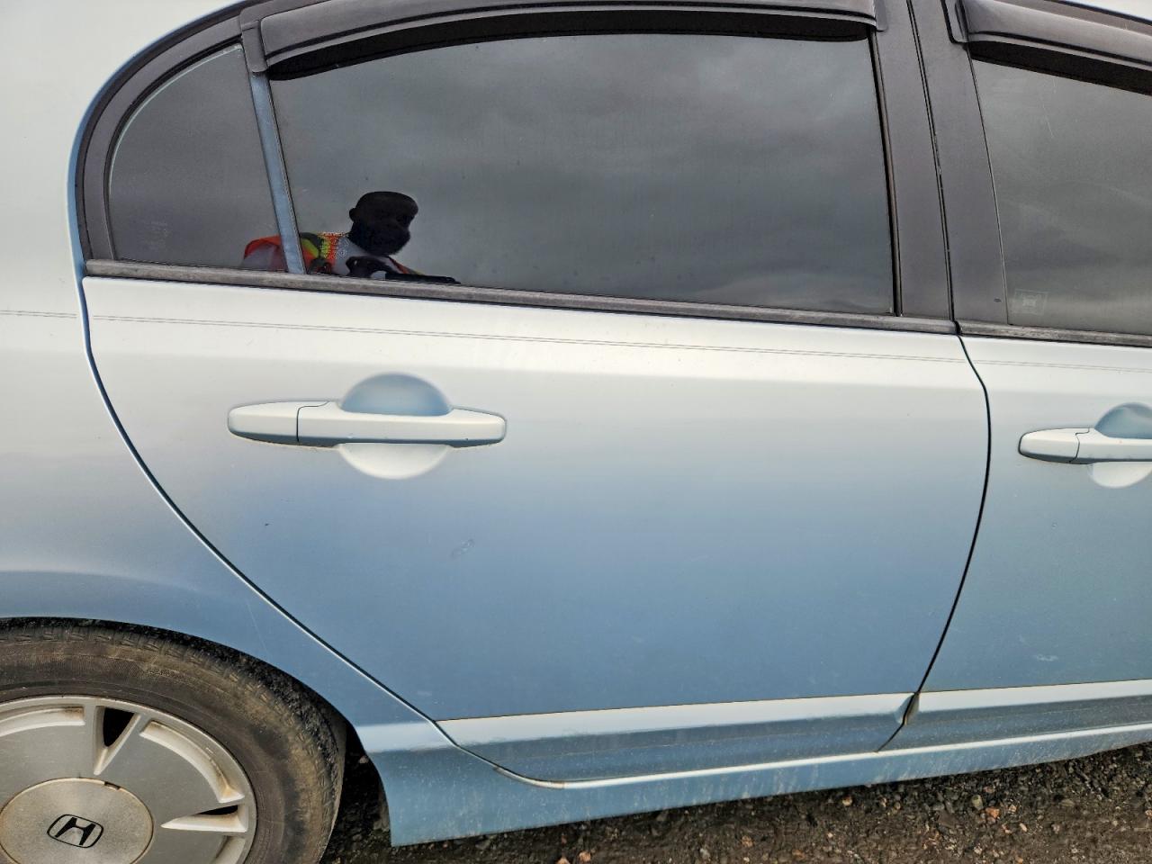 2006 Honda Civic Hybrid Blue vin: JHMFA36216S029374