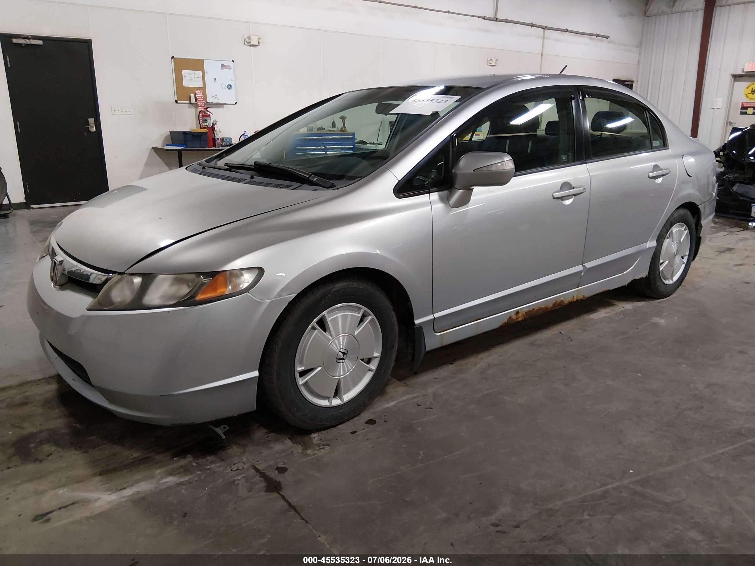 2007 Honda Civic Hybrid   Silver vin: JHMFA36217S023916