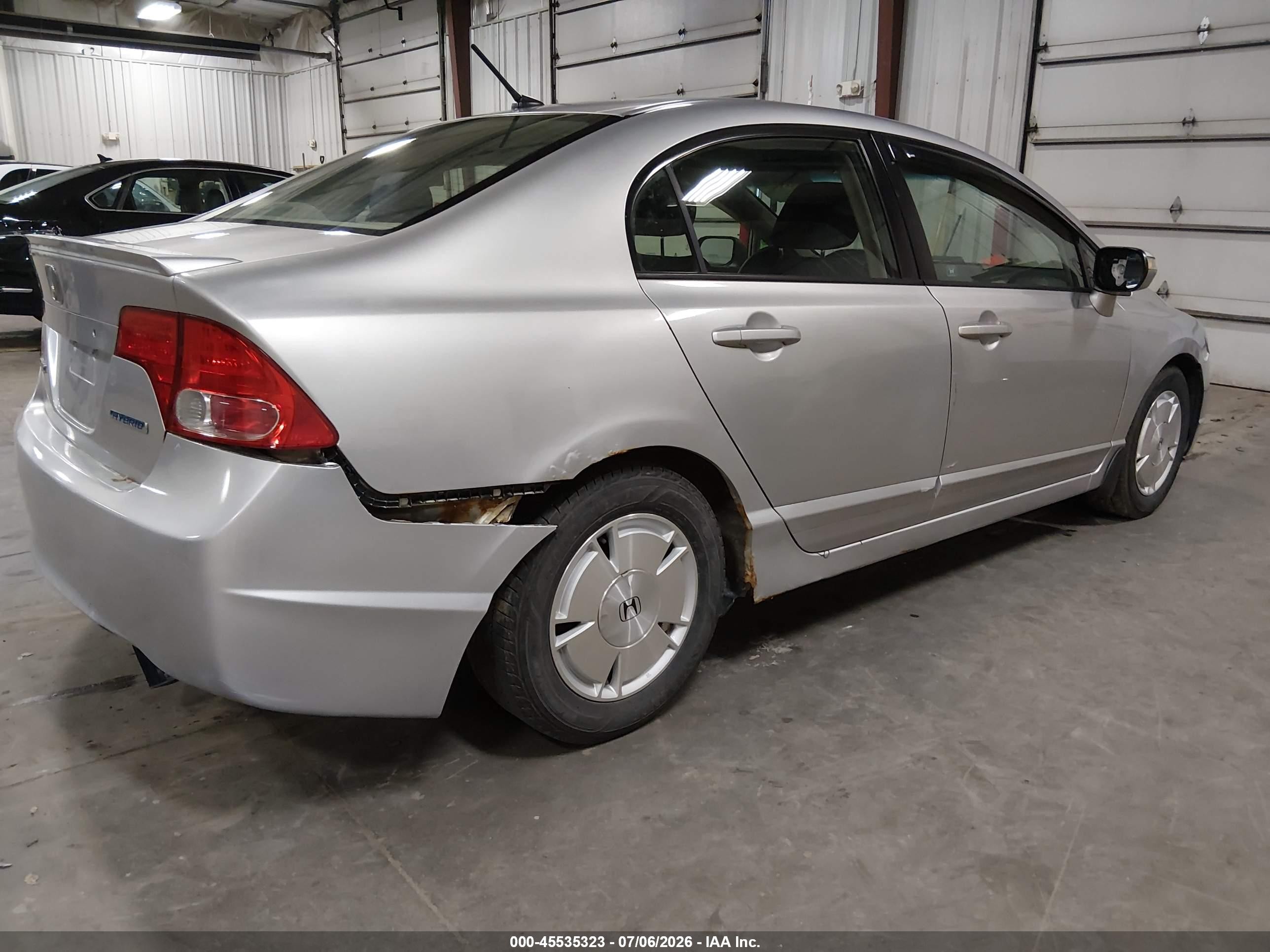 2007 Honda Civic Hybrid   Silver vin: JHMFA36217S023916