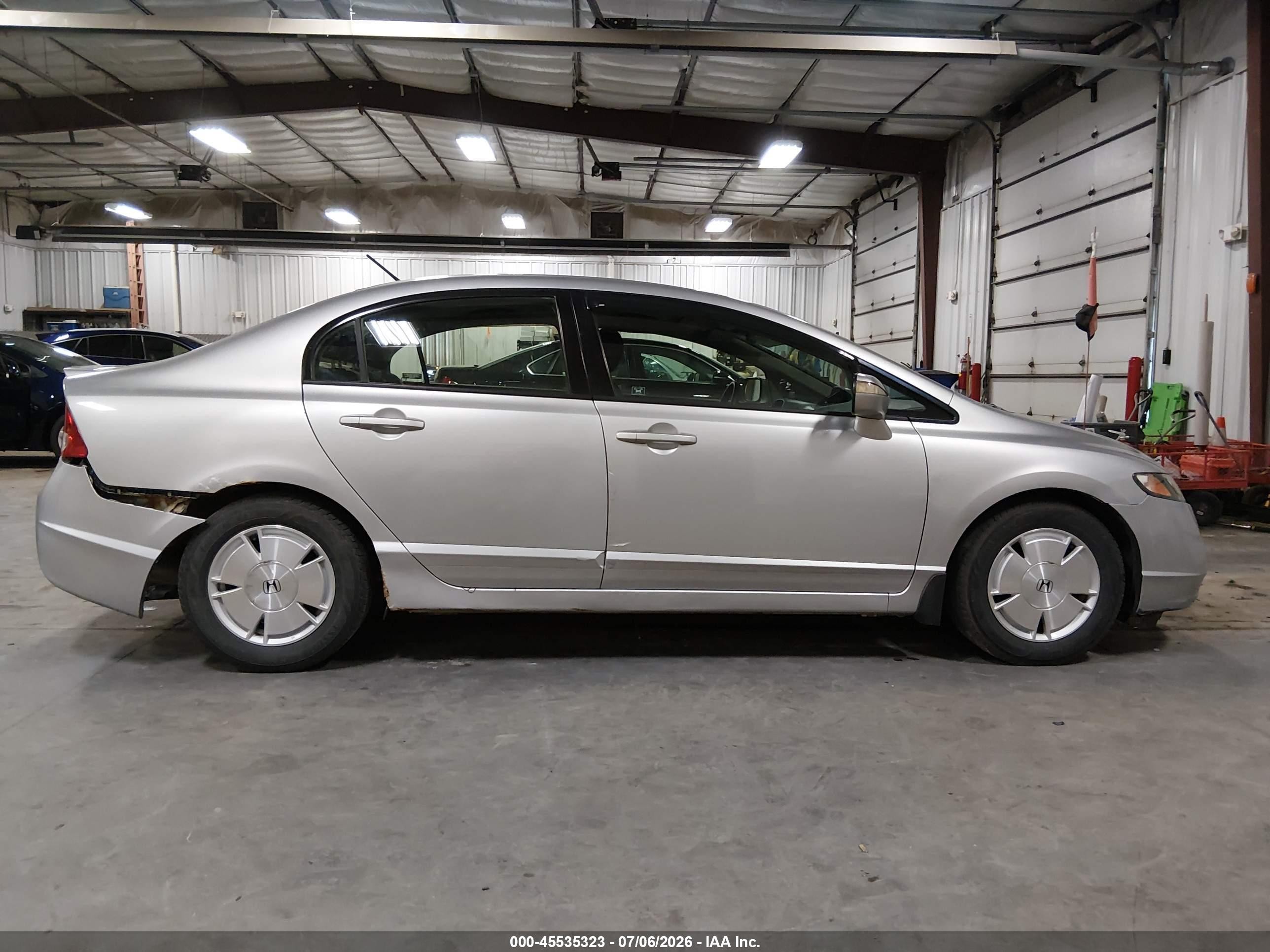 2007 Honda Civic Hybrid   Silver vin: JHMFA36217S023916