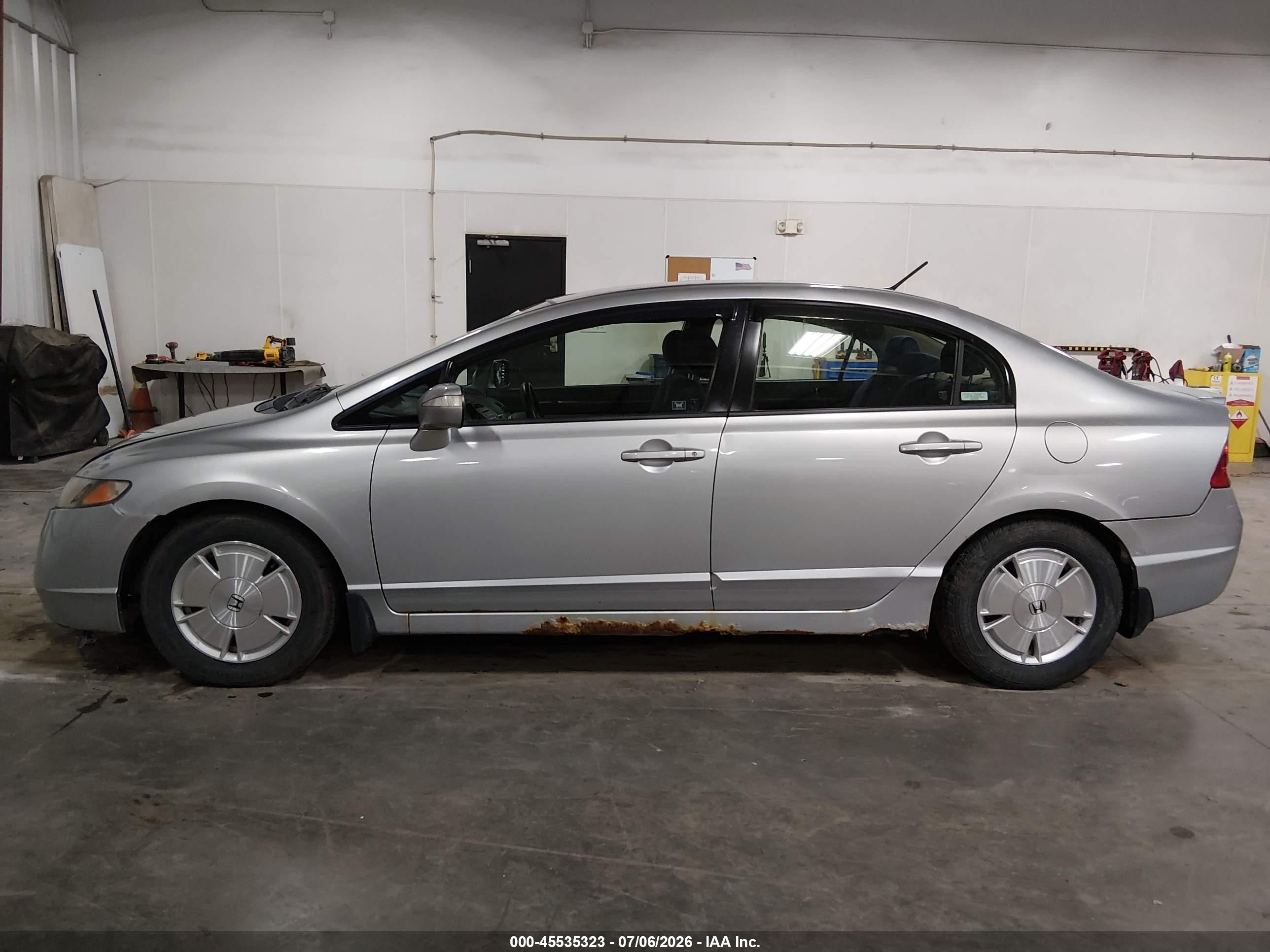 2007 Honda Civic Hybrid   Silver vin: JHMFA36217S023916