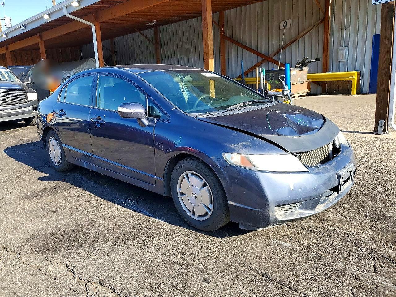 2009 Honda Civic Hybrid Blue vin: JHMFA36229S004083