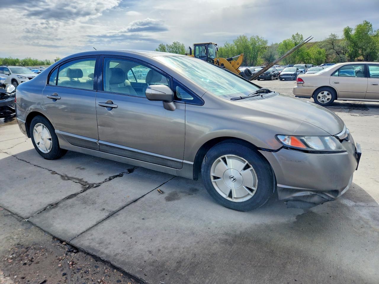 2007 Honda Civic Hybrid Желто-коричневый vin: JHMFA36237S012660