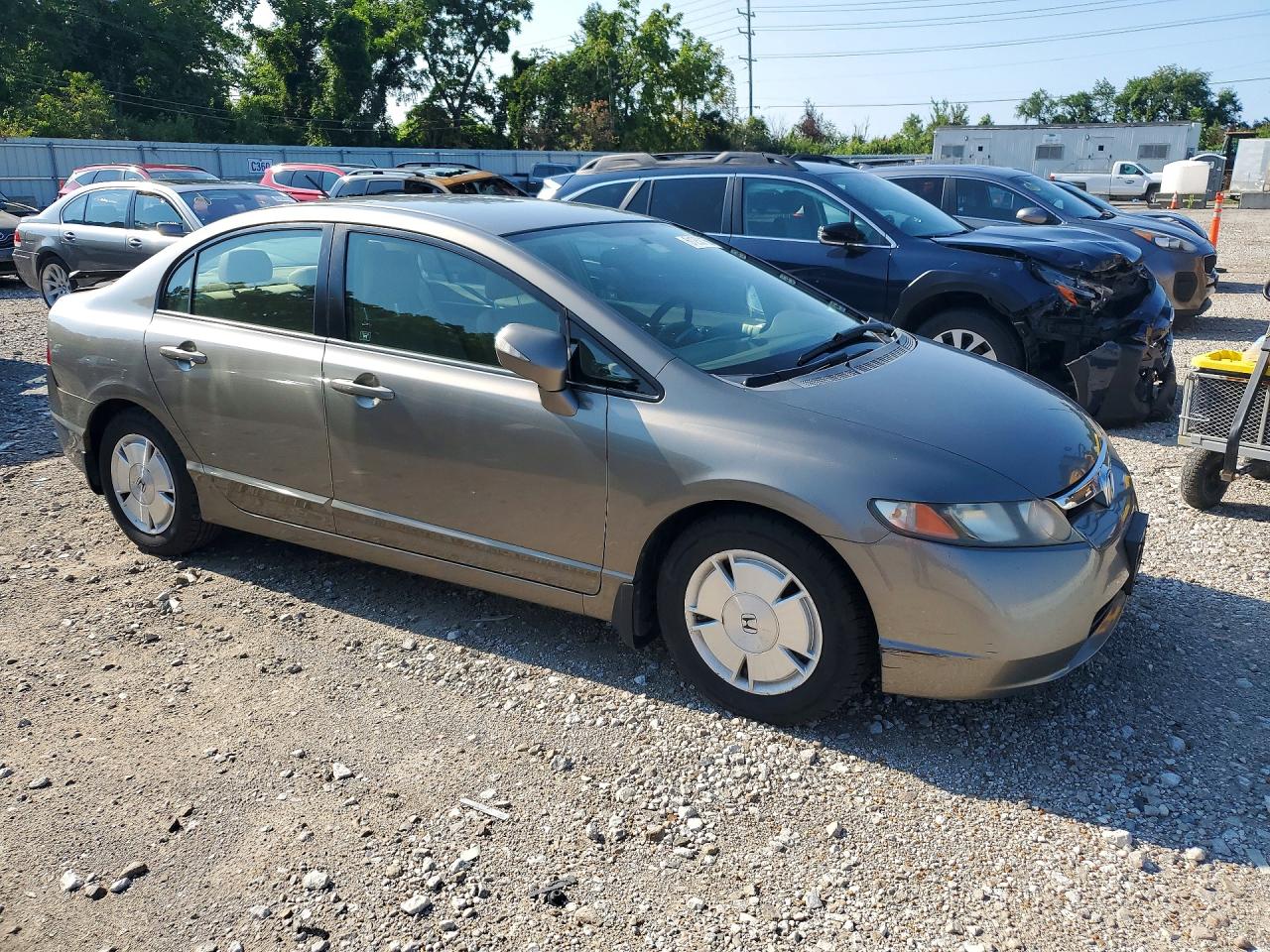 2007 Honda Civic Hybrid Tan vin: JHMFA36237S021780