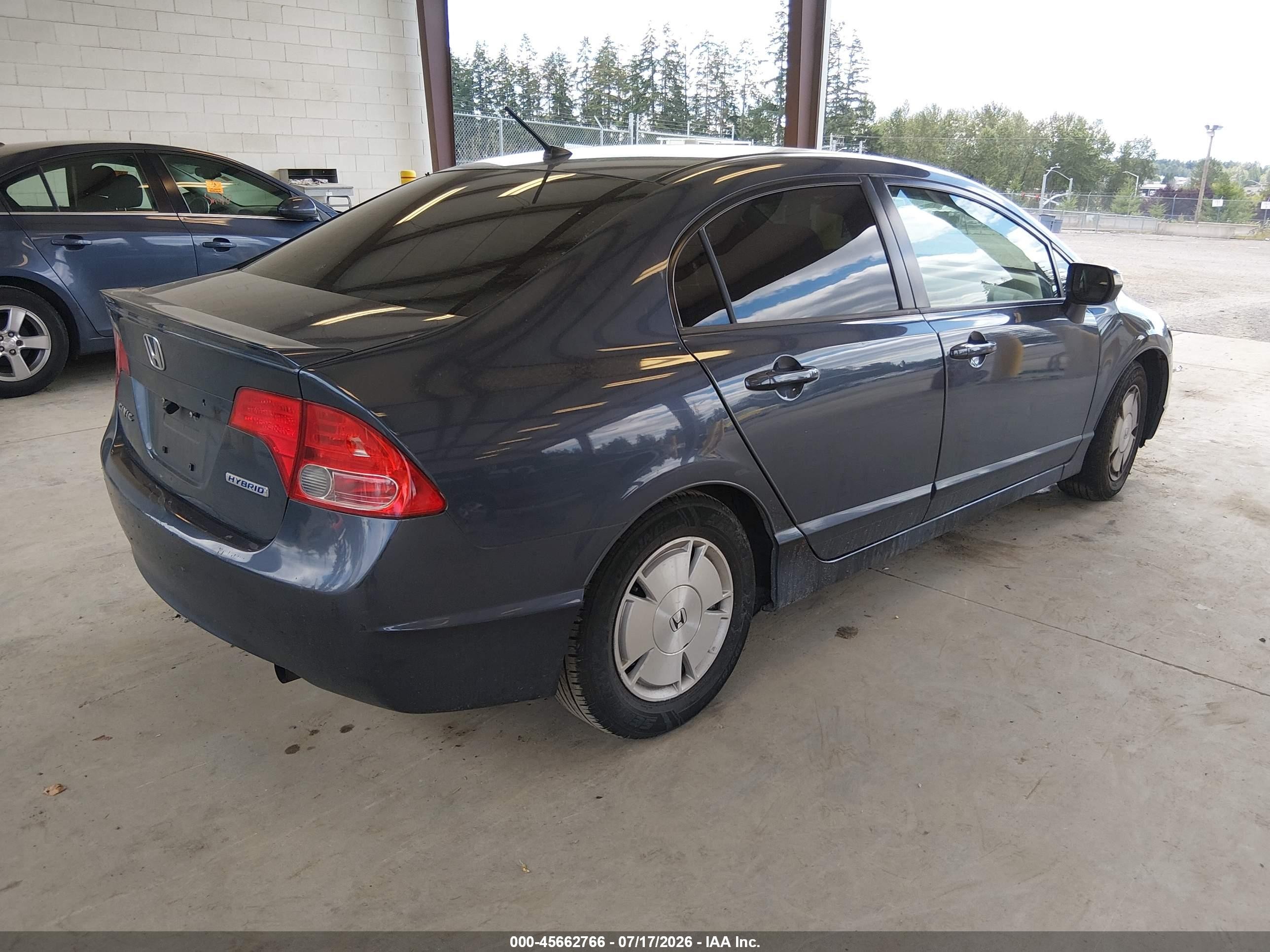2006 Honda Civic Hybrid   Серый vin: JHMFA36246S030471