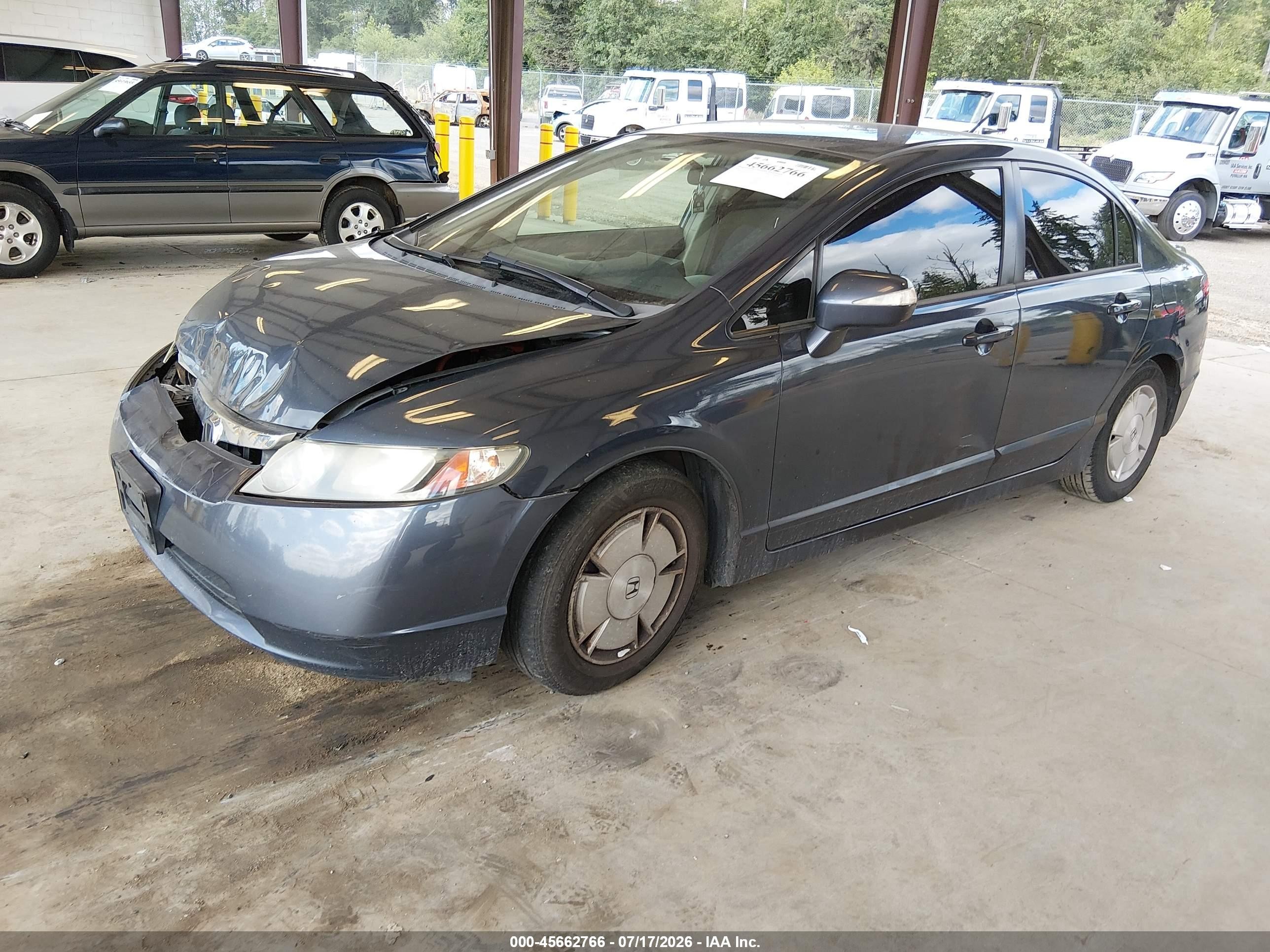 2006 Honda Civic Hybrid   Серый vin: JHMFA36246S030471