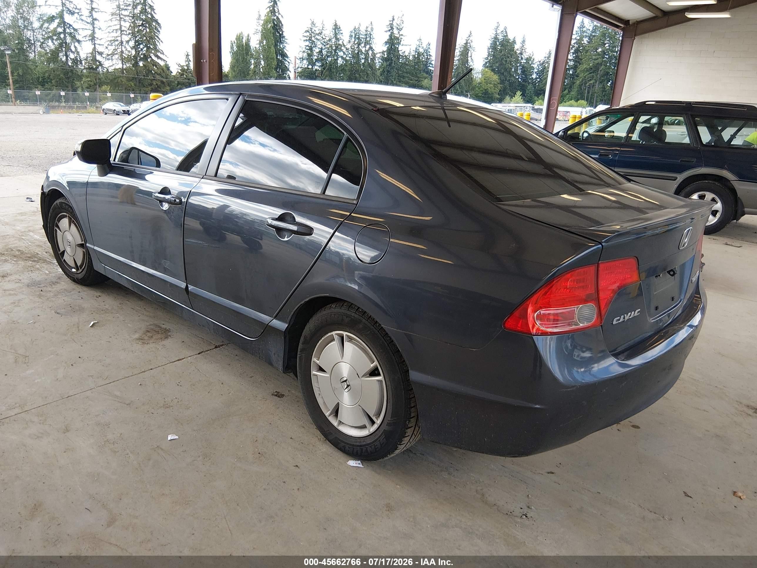 2006 Honda Civic Hybrid   Серый vin: JHMFA36246S030471
