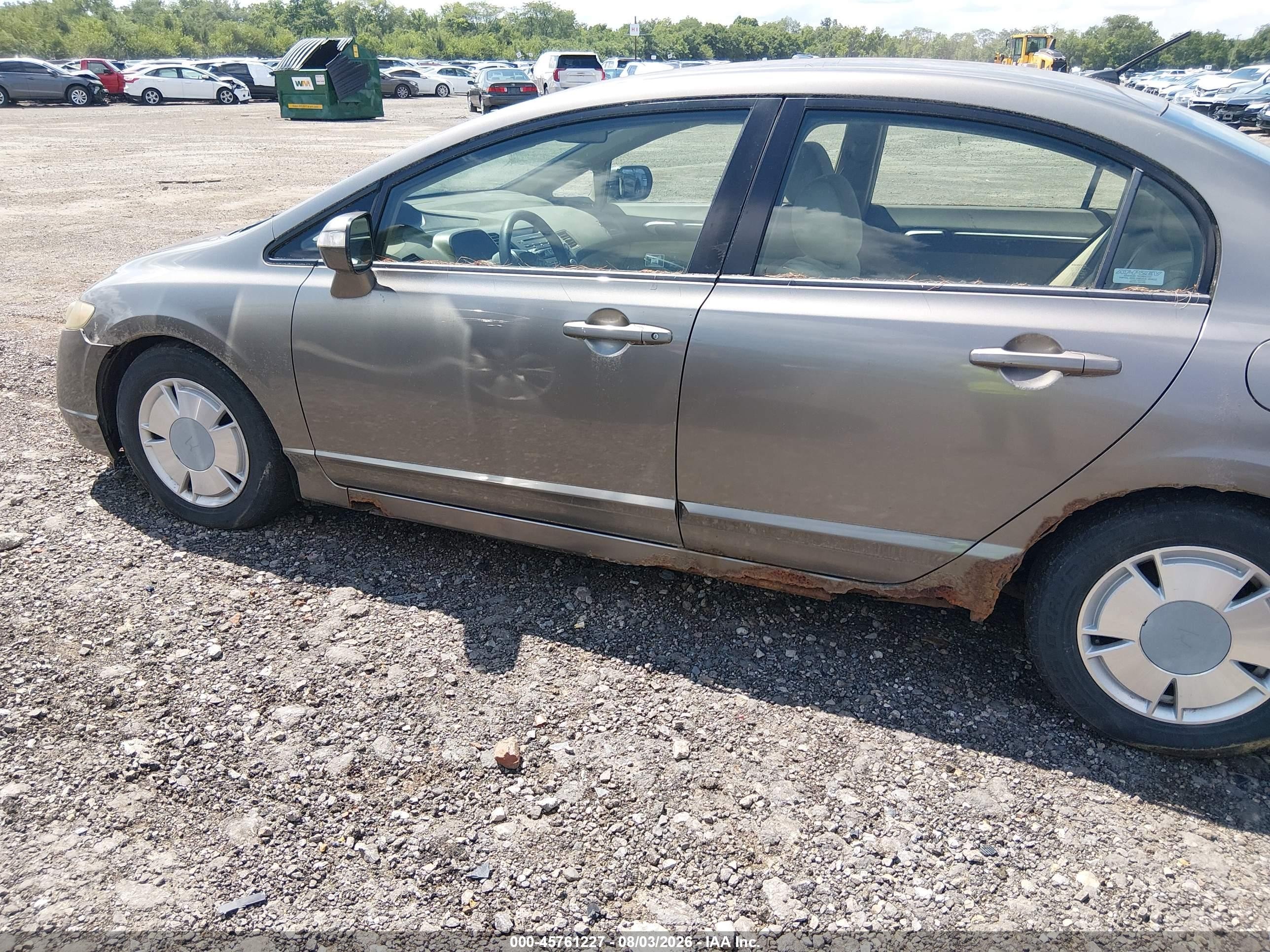 2007 Honda Civic Hybrid   Серебряный vin: JHMFA36247S018323