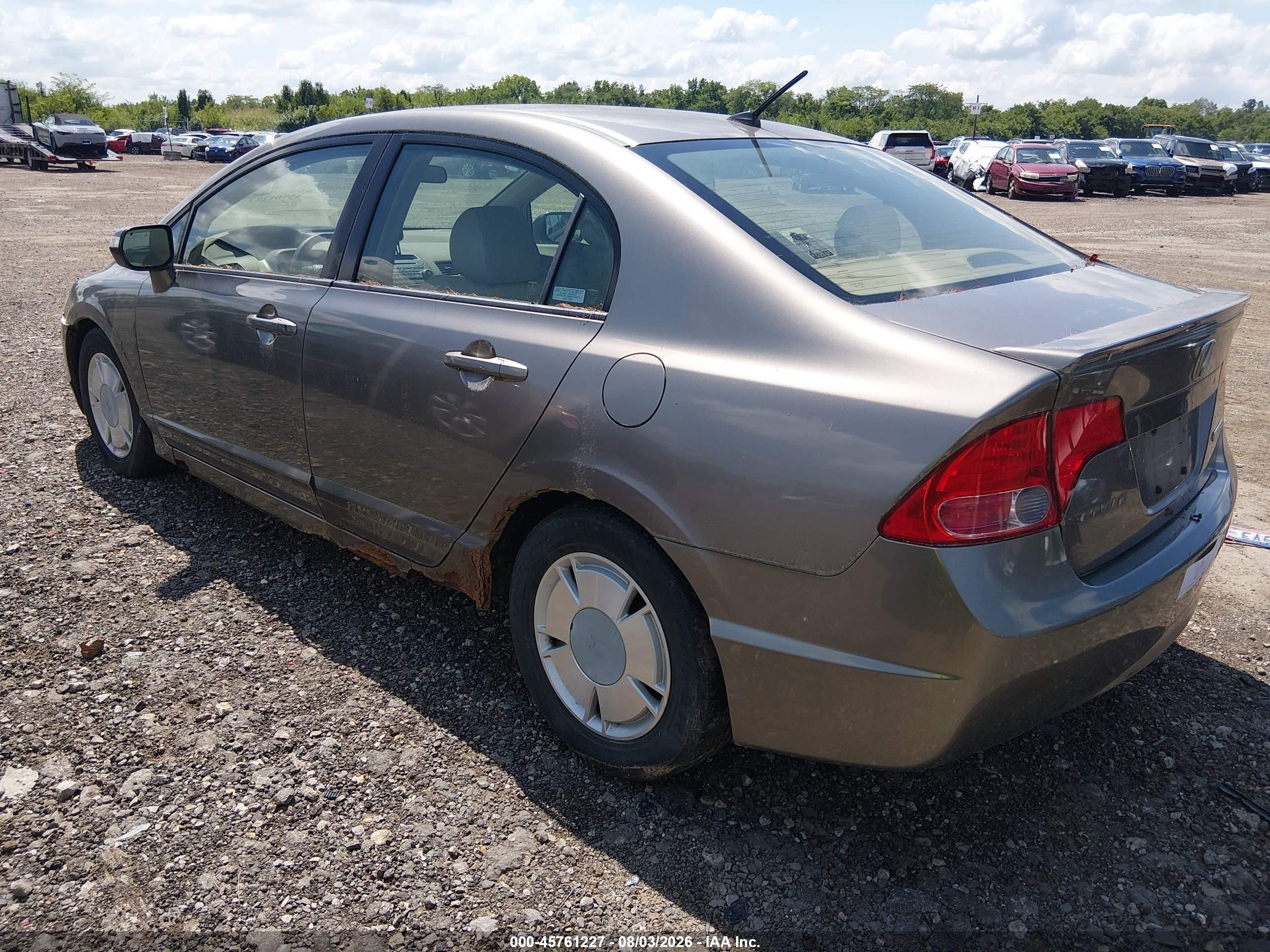 2007 Honda Civic Hybrid   Серебряный vin: JHMFA36247S018323