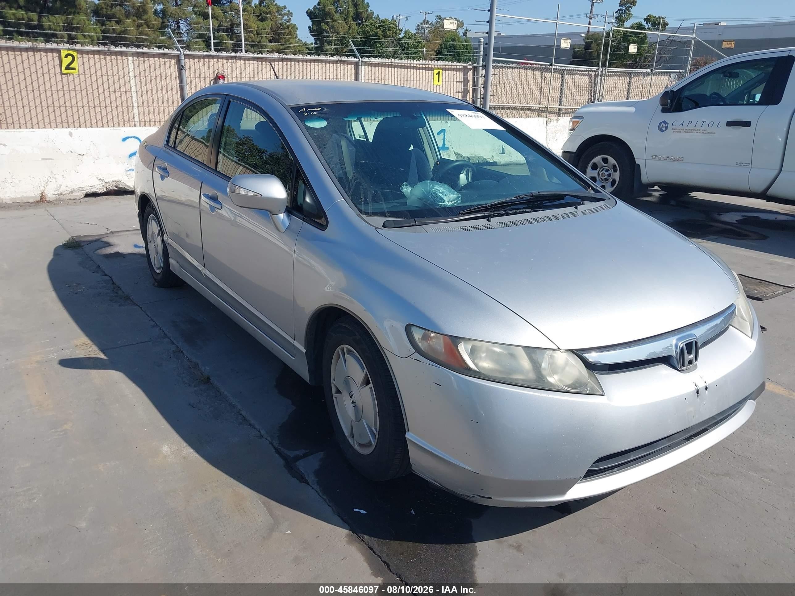2007 Honda Civic Hybrid   Серебряный vin: JHMFA36247S018533