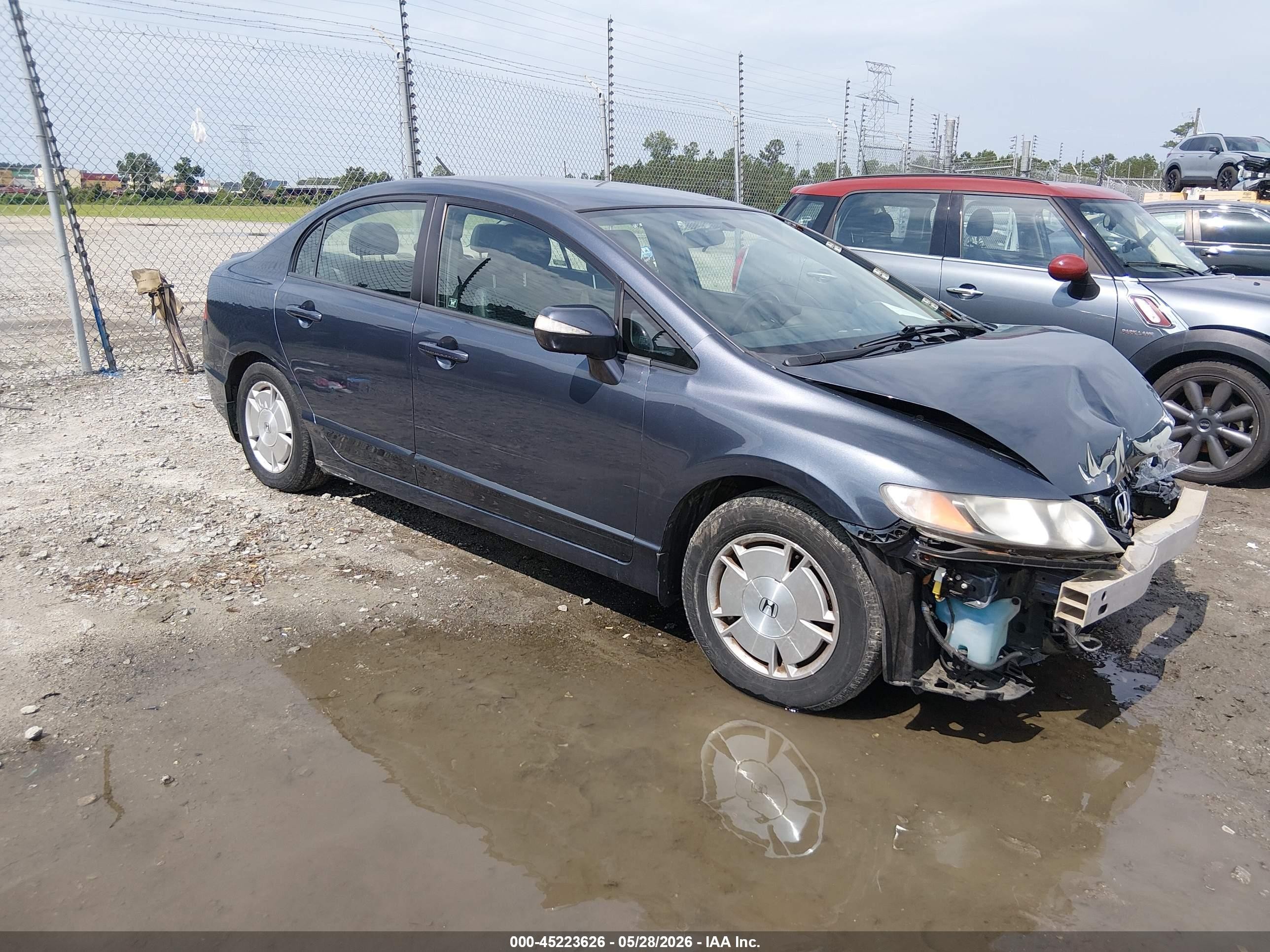 2009 Honda Civic Hybrid   Dark Blue vin: JHMFA36249S009477