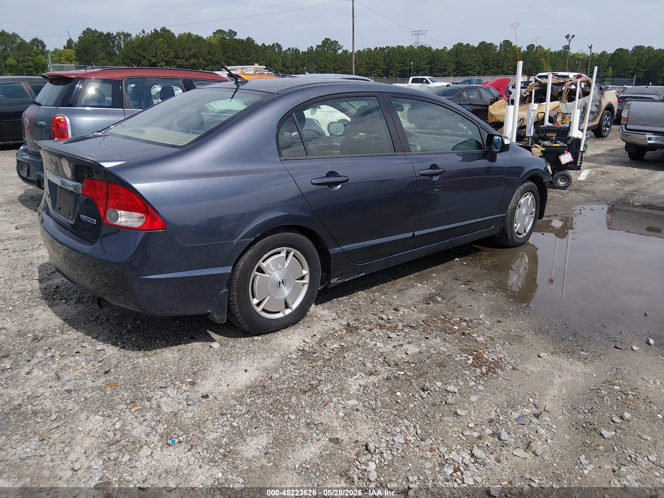 2009 Honda Civic Hybrid   Dark Blue vin: JHMFA36249S009477