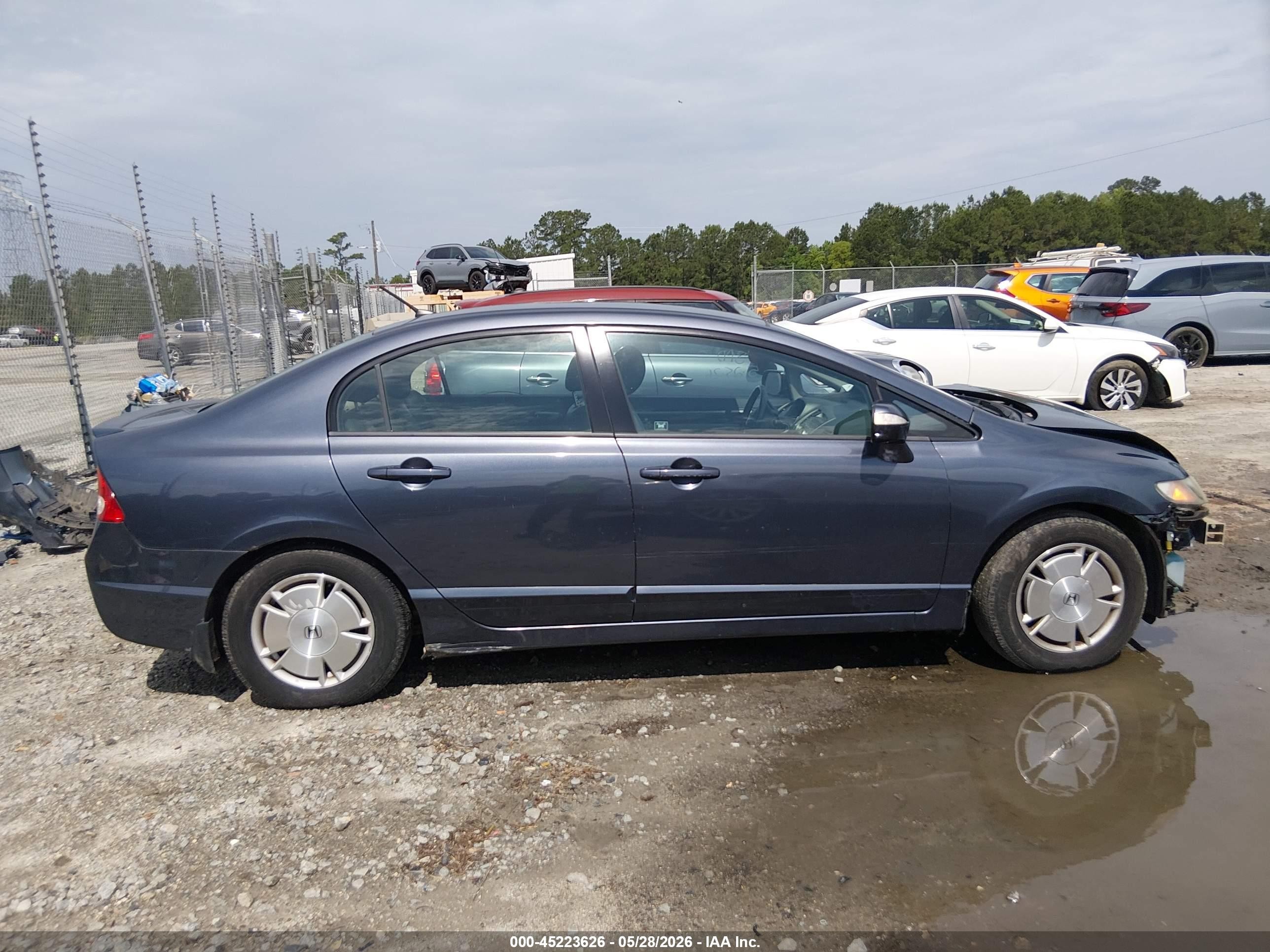2009 Honda Civic Hybrid   Dark Blue vin: JHMFA36249S009477