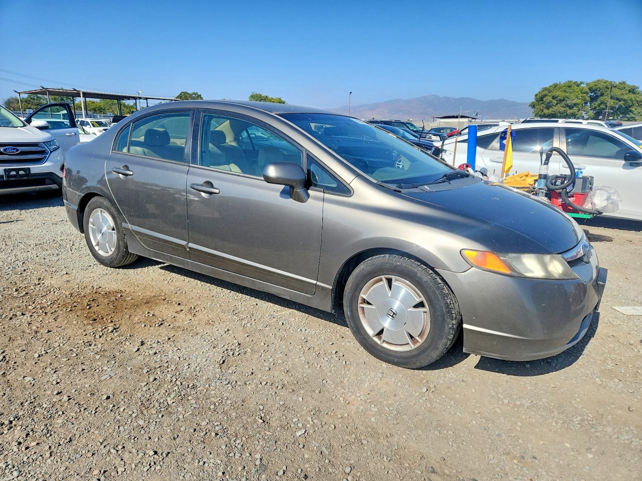 2006 Honda Civic Hybrid Gold vin: JHMFA36266S004020