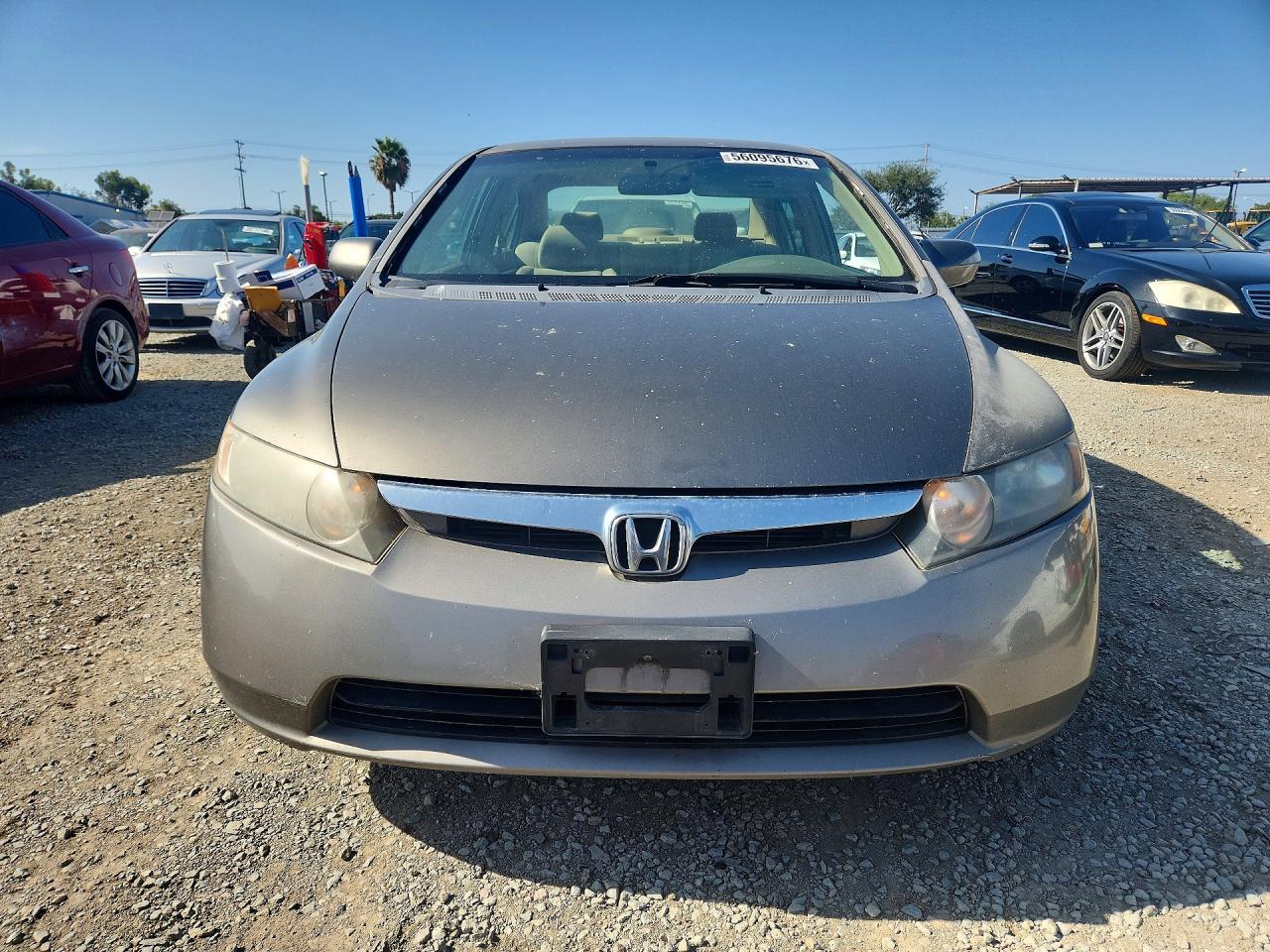 2006 Honda Civic Hybrid Gold vin: JHMFA36266S004020