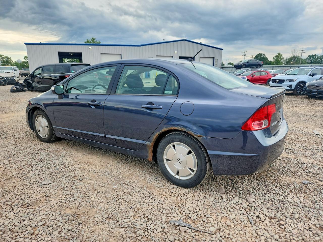 2006 Honda Civic Hybrid Blue vin: JHMFA36266S028026